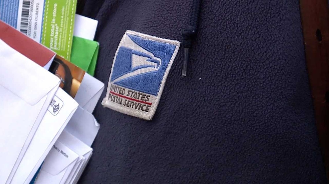 USPS mail carriers working overtime delivering holiday packages