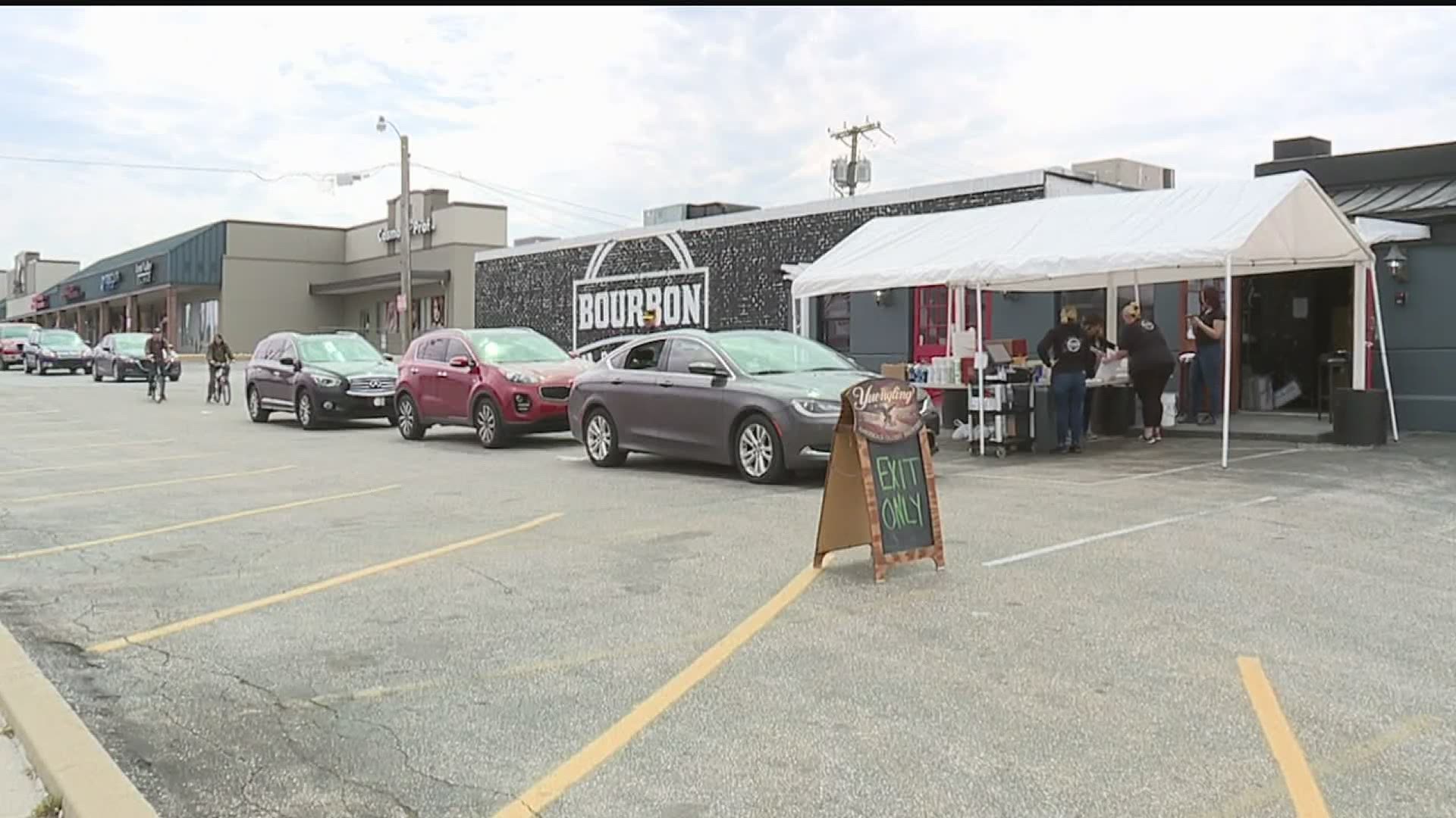 Bourbon Bar and Grill took an anonymous $300 donation and turned it into 700 pounds of cooked pork for dozens of families.