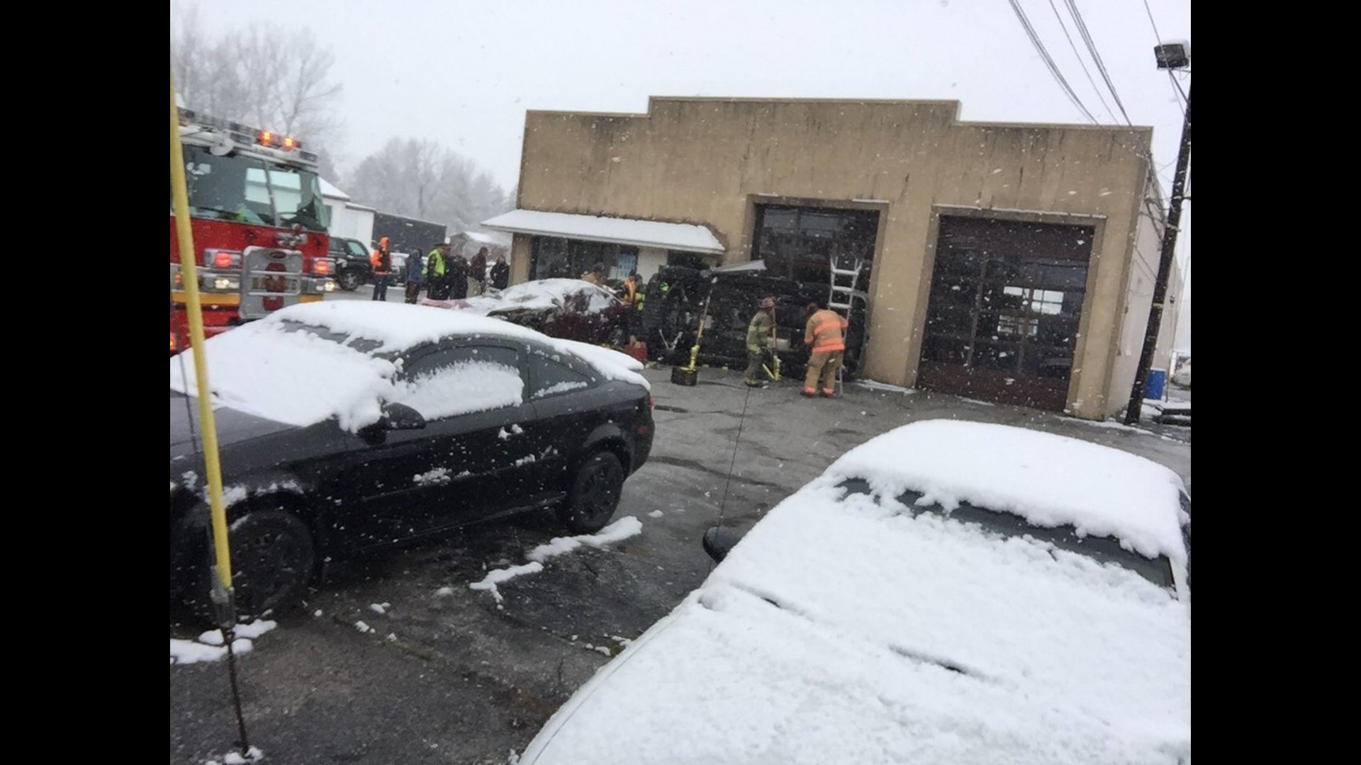 Photos person in Dover Borough car accident trapped inside car