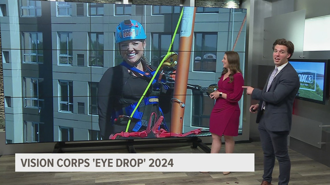 Participants rappel down a buidling for VisionCorps fifth annual Eye ...