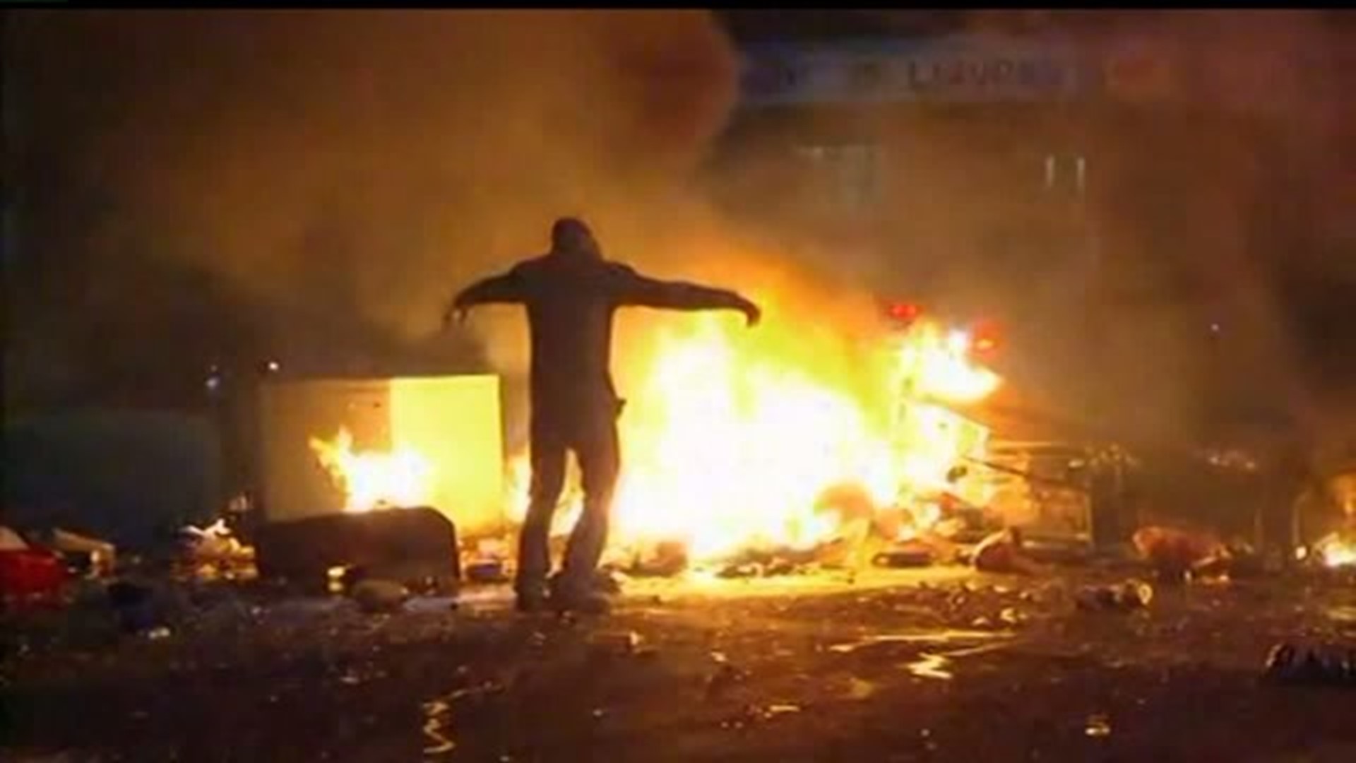 Police and firefighters trying to restore order after rioting in Baltimore