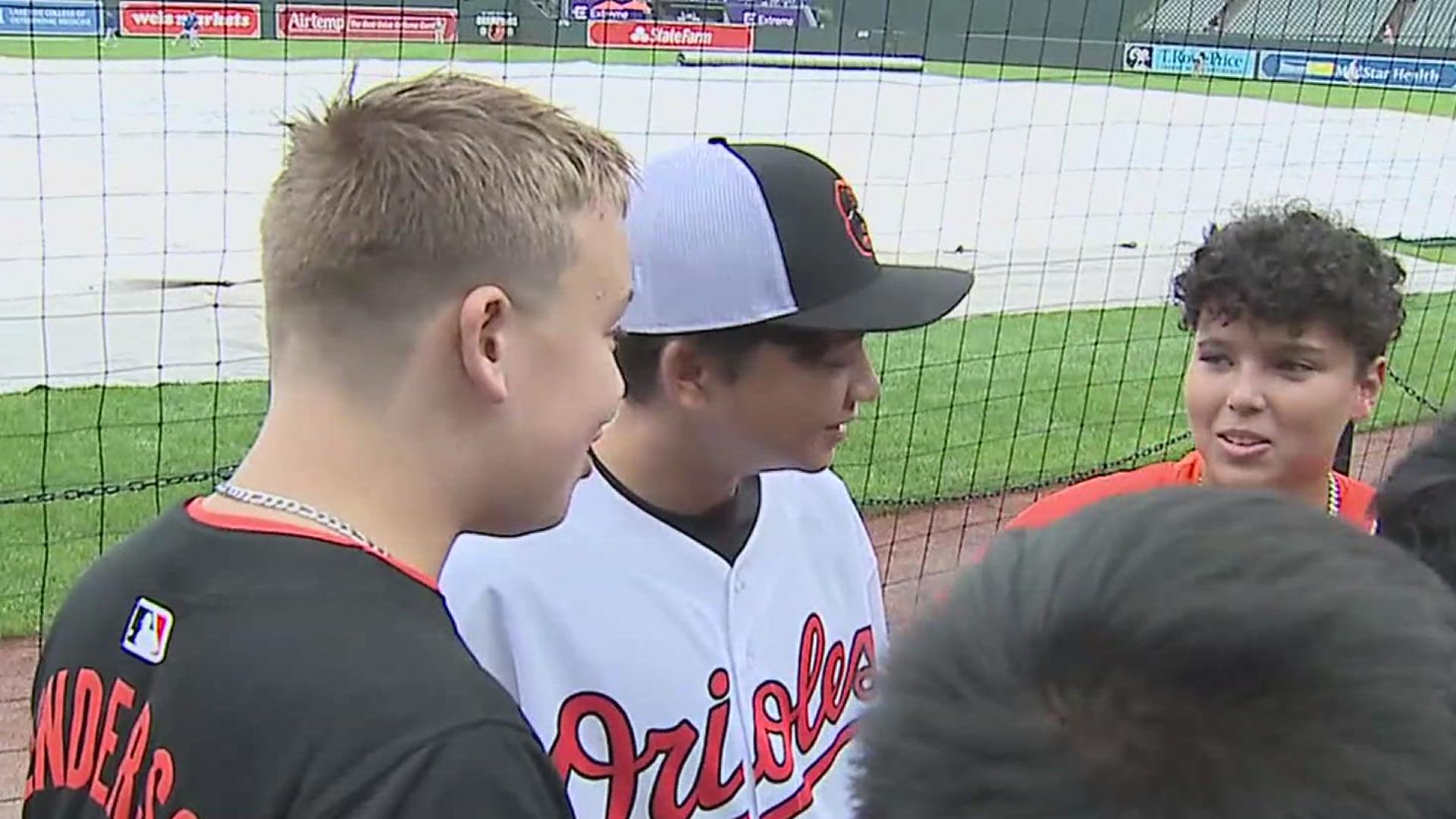 The gifted tickets included a chance to be on the field before the game.