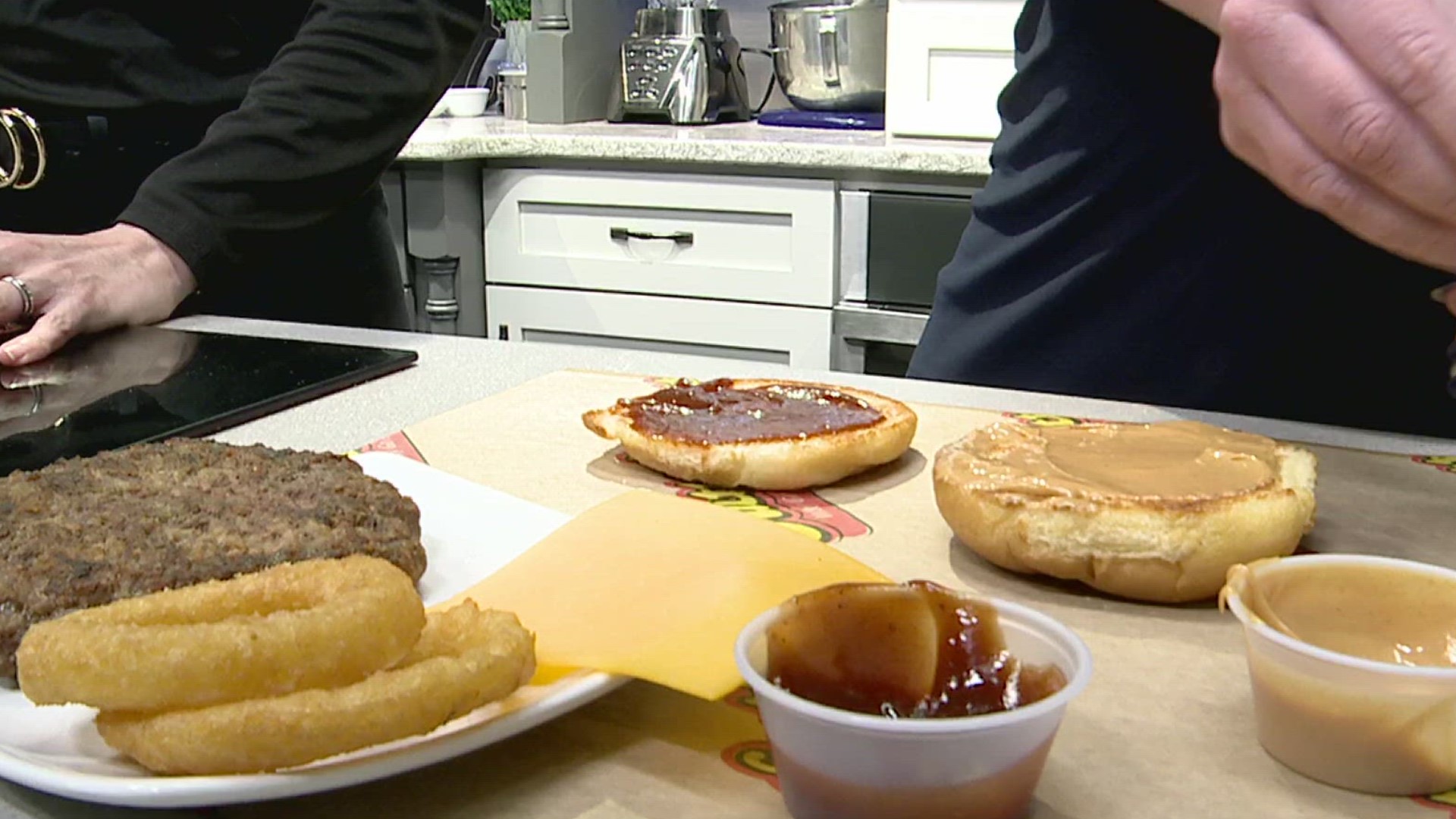 FOX43 Morning News anchors Jackie De Tore and Sean Streicher tried a Peanut Butter Burger from the gas station's new Rutter’s Lovers Inspired Food Menu.