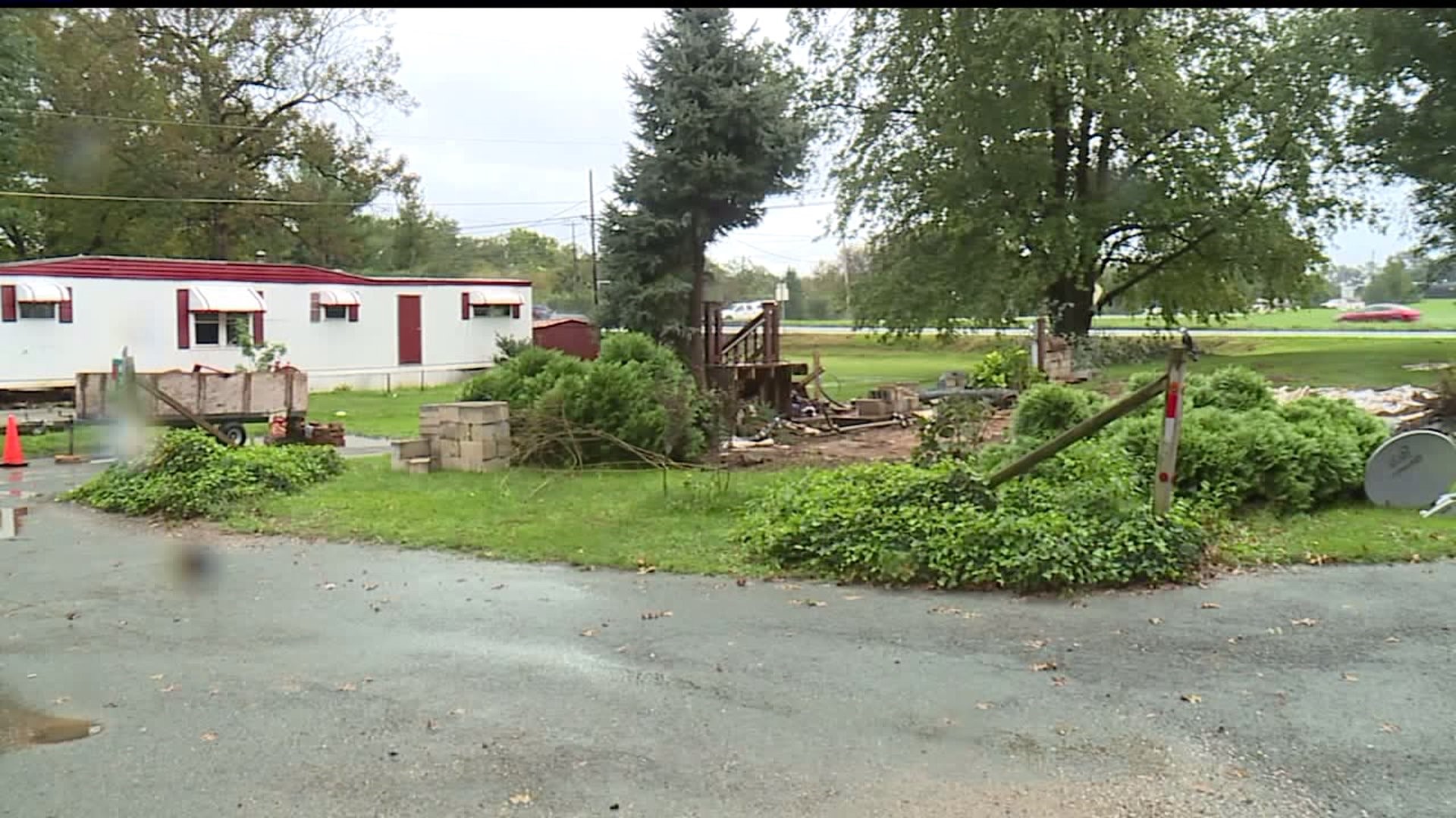 Construction company pays homeowners for flood damages