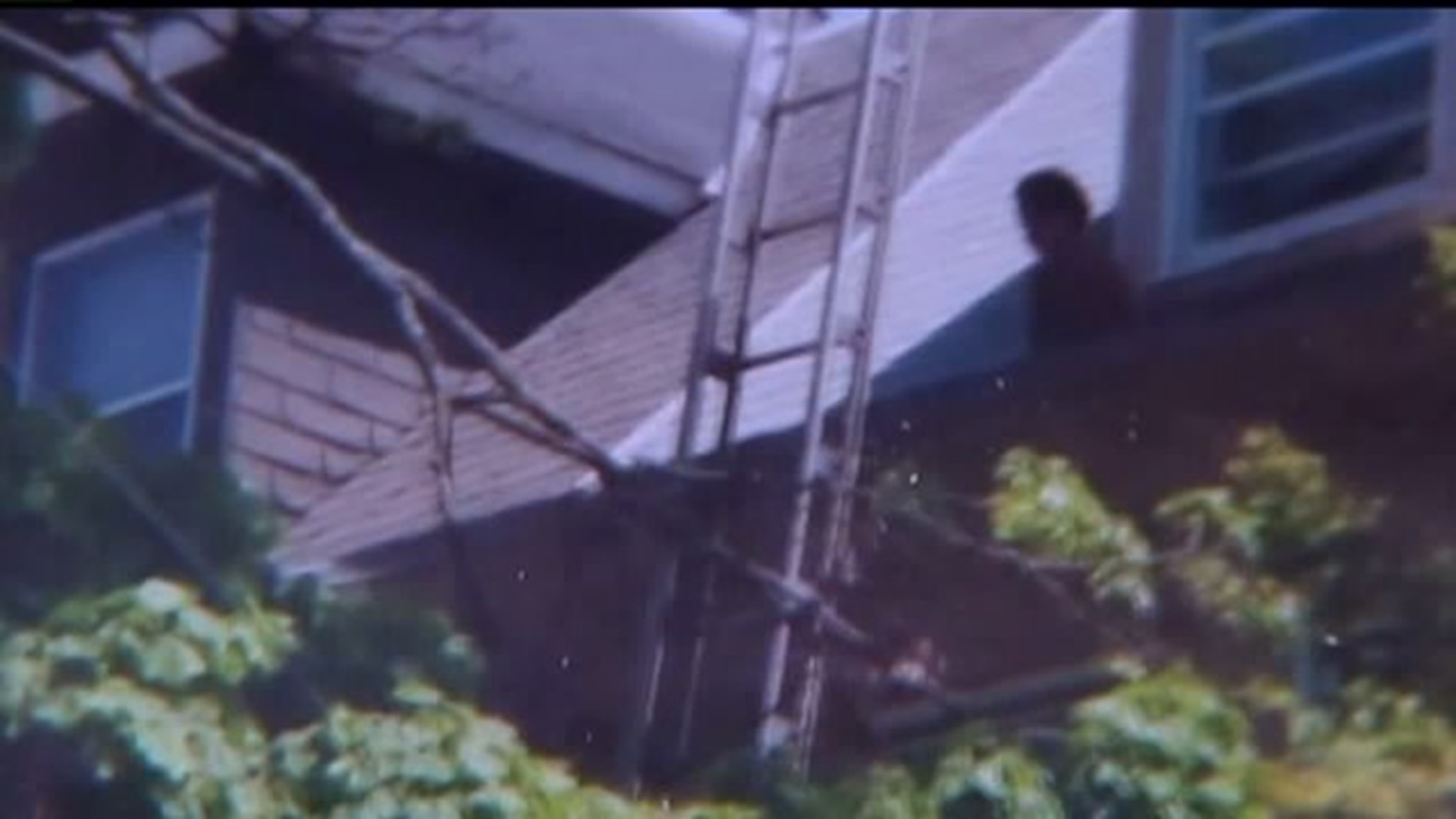 Philadelphia police rescue toddler from roof of a 3-story home