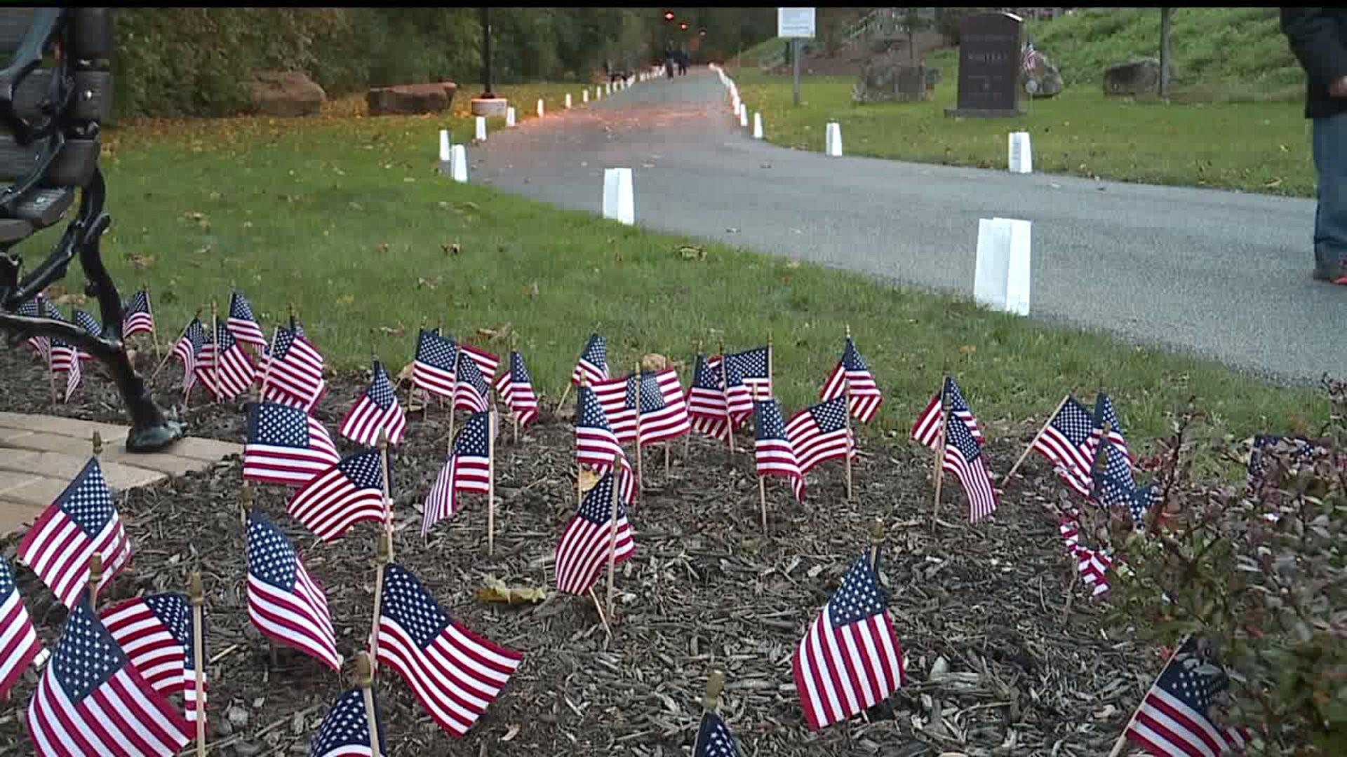 Hundreds of luminaries honor veterans on Winters Memorial Path