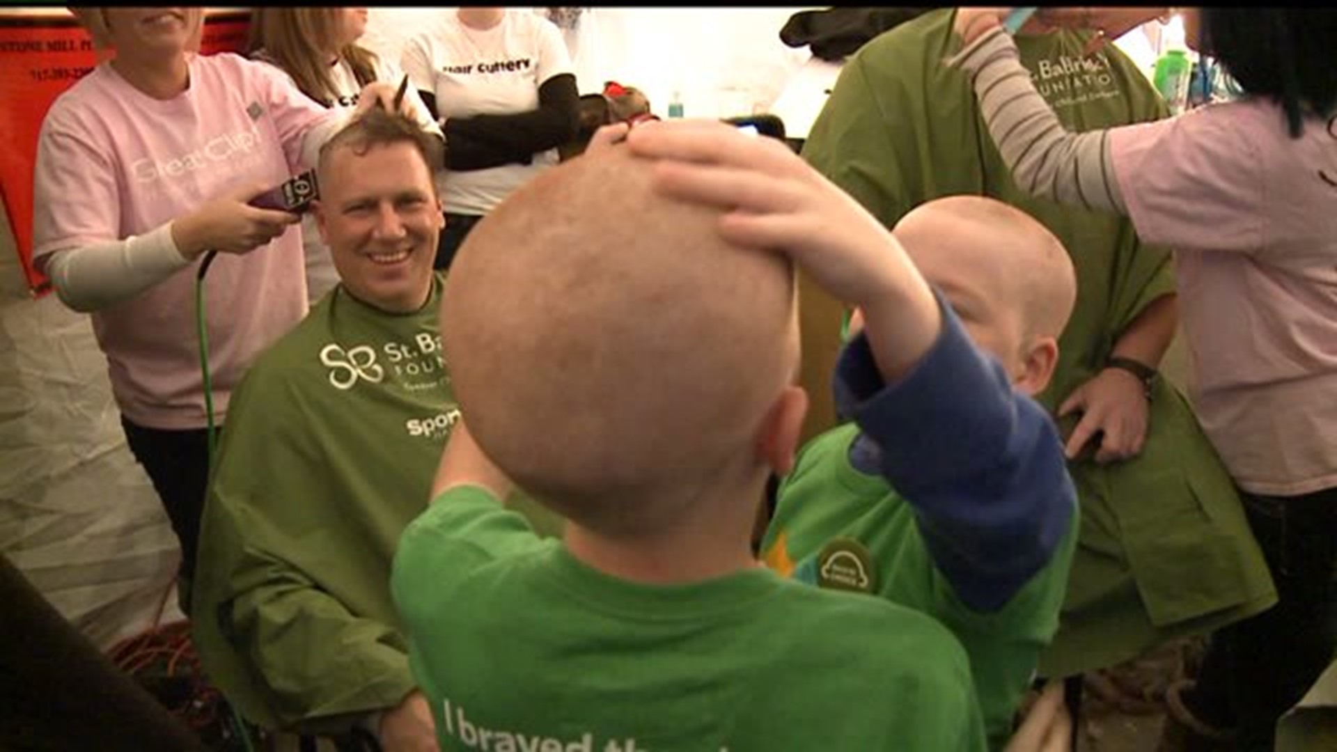 Volunteers go bald for cancer research