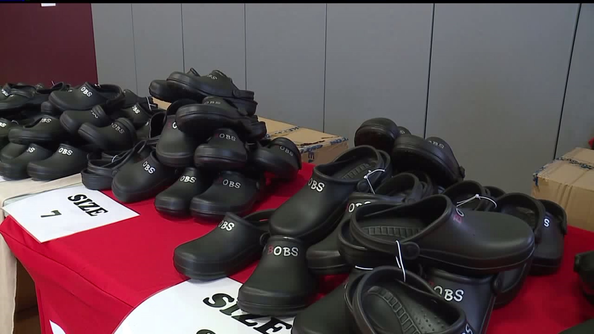 Skechers and Super Shoes donate shoes to kids in need
