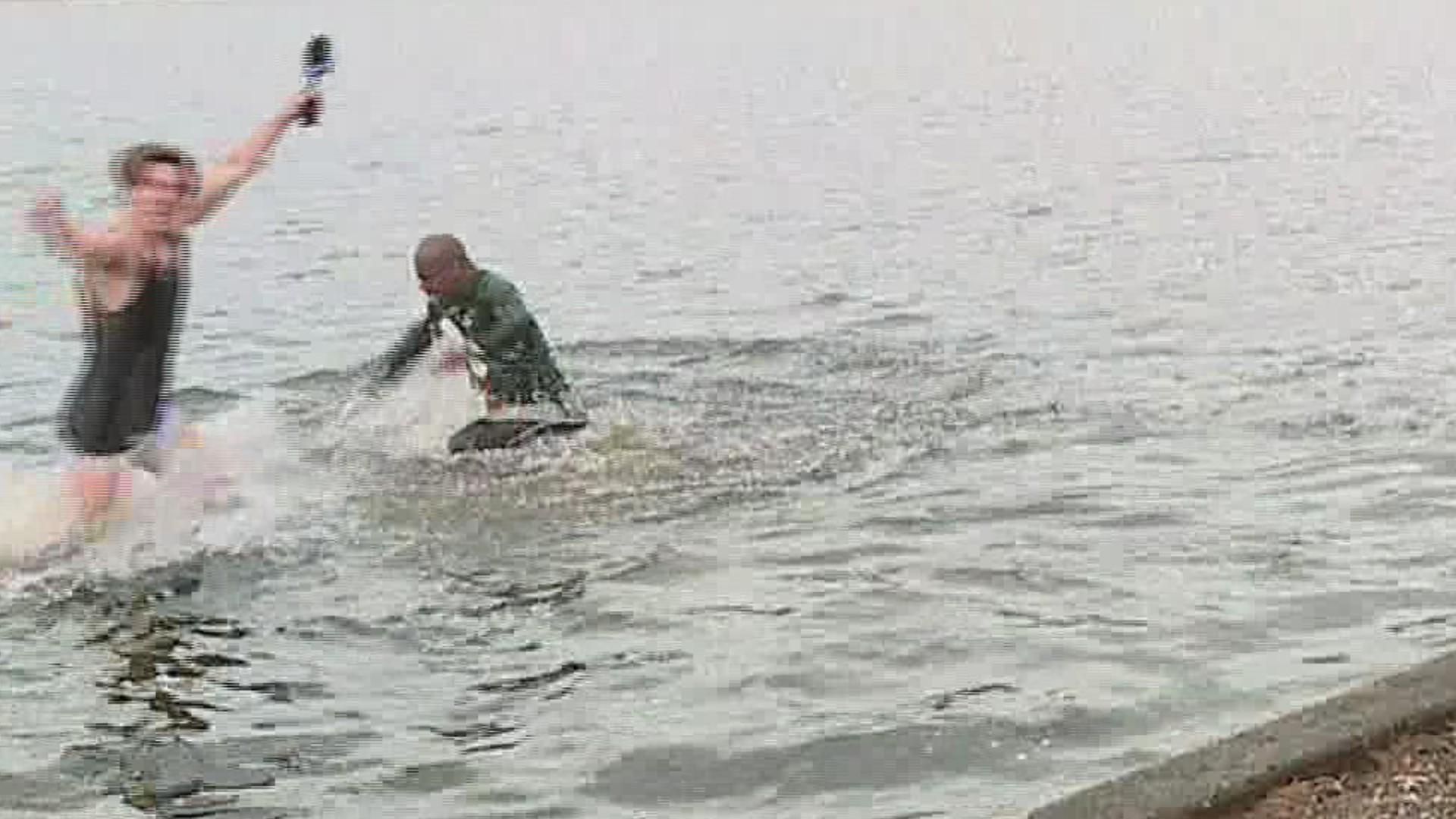 Reporter Tyler Hatfield and photojournalist James Manjo take a polar plunge in support of Special Olympics Pennsylvania.