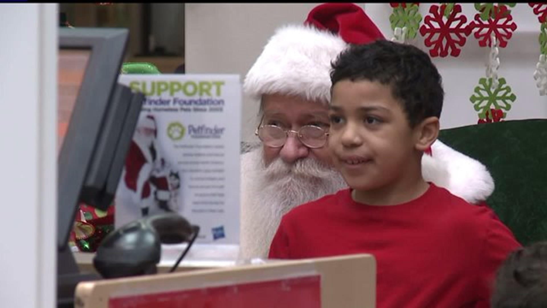 Special needs children visit with Santa