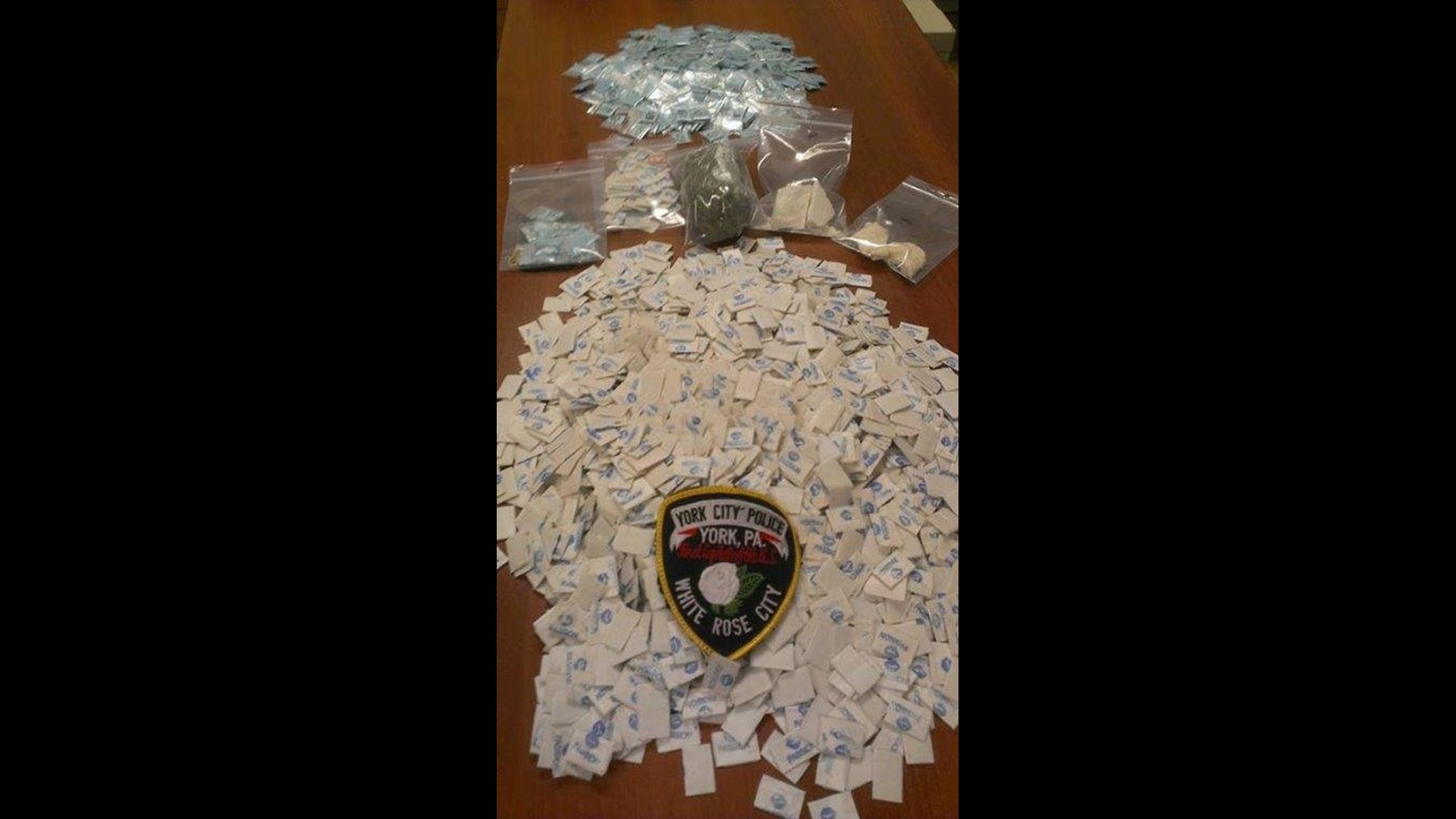 Suspected drug dealer charged, police seize 2,500 bags of Heroin ...