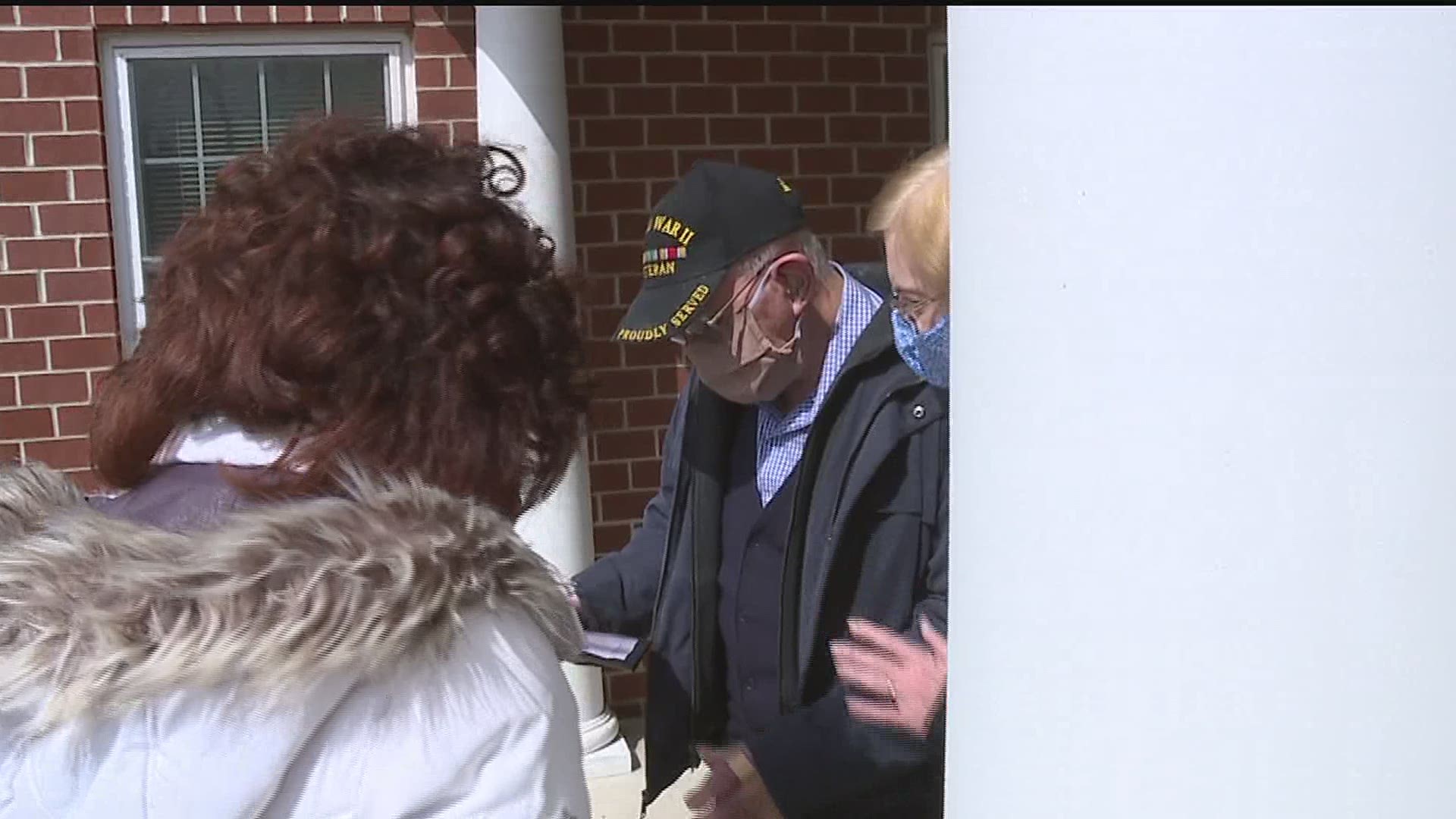 Firefighters join birthday parade held for 100 year old veteran.