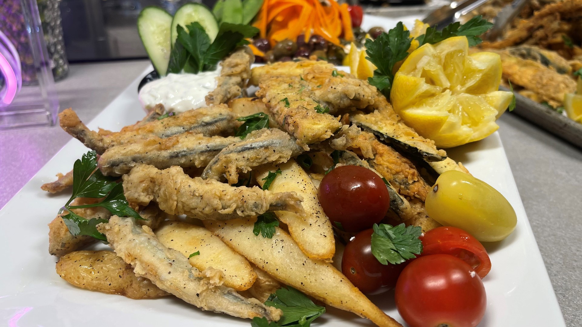 Olivia's fries up fish with a Greek flair. A tipsy dragon cocktail gives the meal a light, fruity finish.