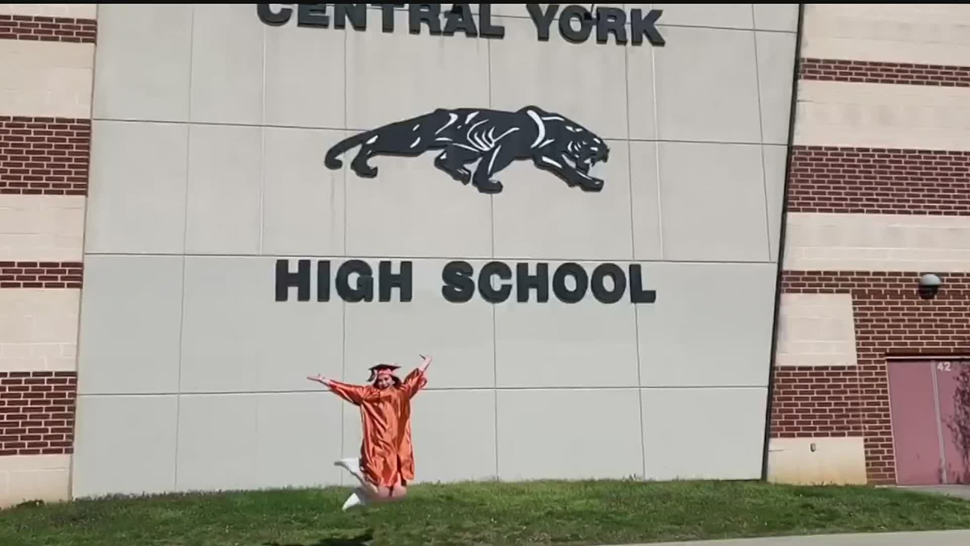A Central York High School senior and her family made a light-hearted video of her walking alone at graduation, while trying to keep everyone's spirits up.