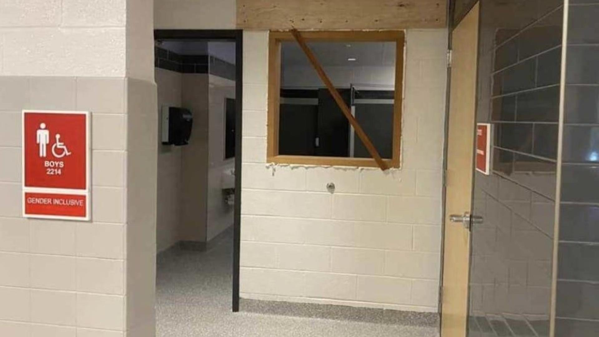 South Western School District has reversed course and boarded up a window opening into its two gender-neutral-designated bathrooms.