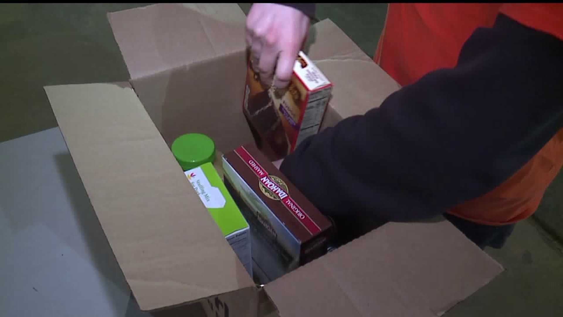 Volunteers box up holiday meals for York County families