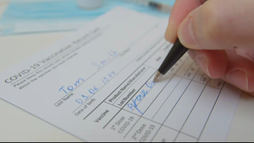 Why posting your vaccine card selfie is a bad idea