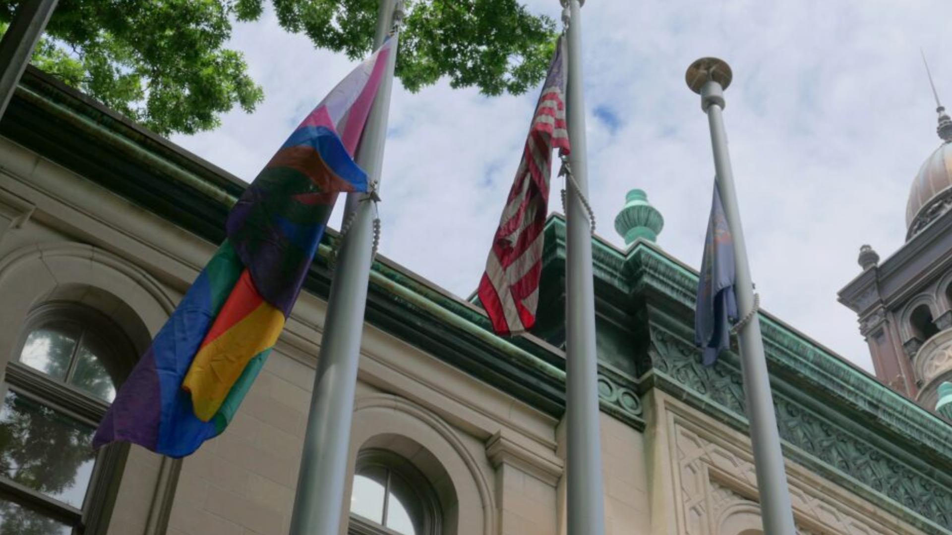 Members of the Lancaster City community gathered at City Hall on Monday to raise the Pride flag.