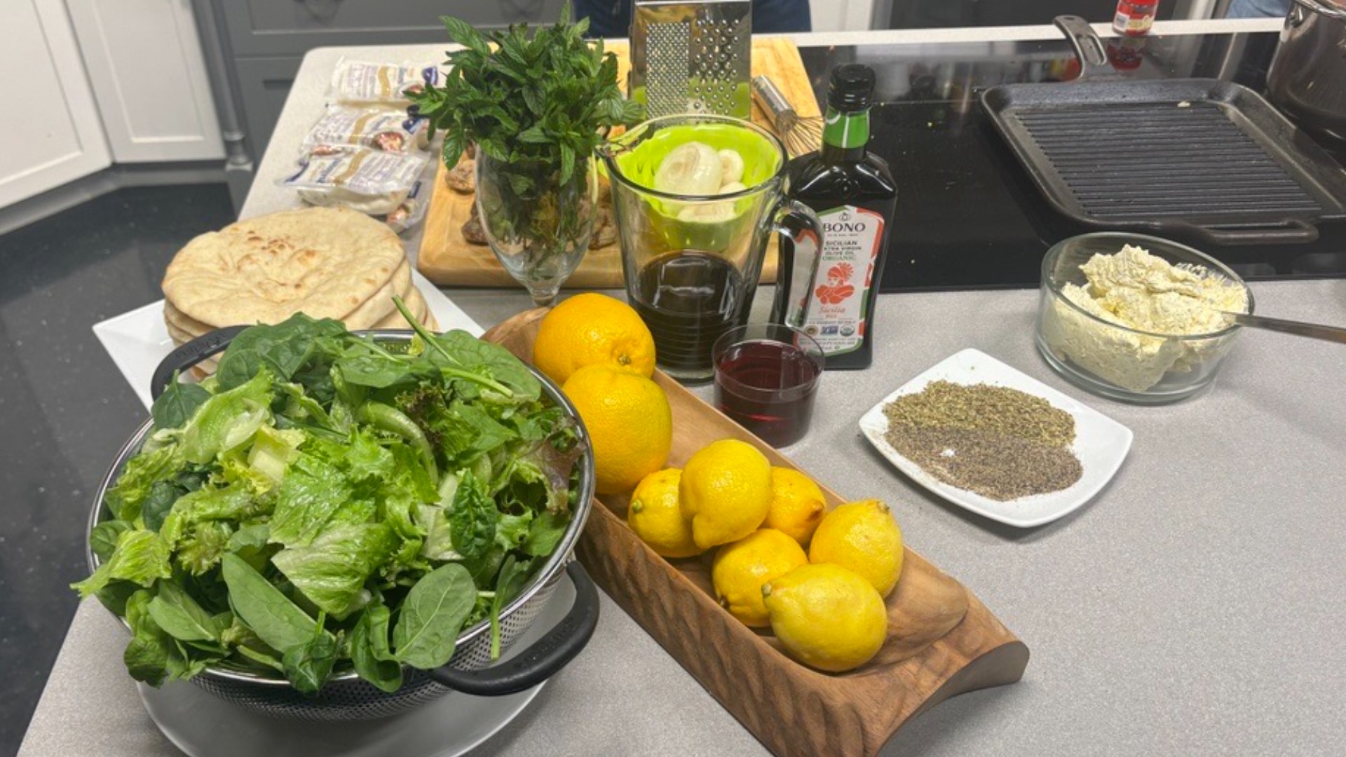 Olivia's bridges the gap between unseasonably warm weather and the encroaching autumn with a light yet hearty Lamp Lollipop Salad topped with a fruity vinaigrette.