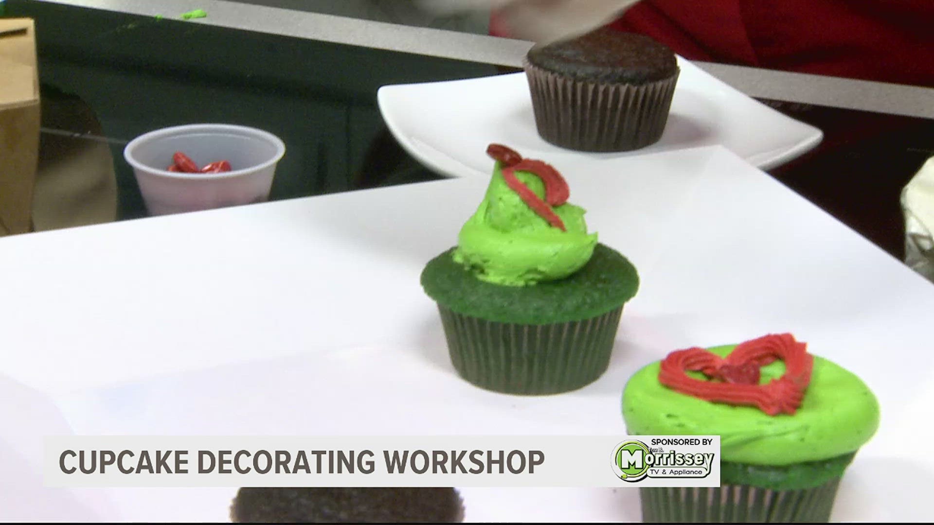 The "Grumpy Ole Green Guy" helped decorate cupcakes in a preview of Sugar Rose Bake Shop's cupcake decorating workshop.