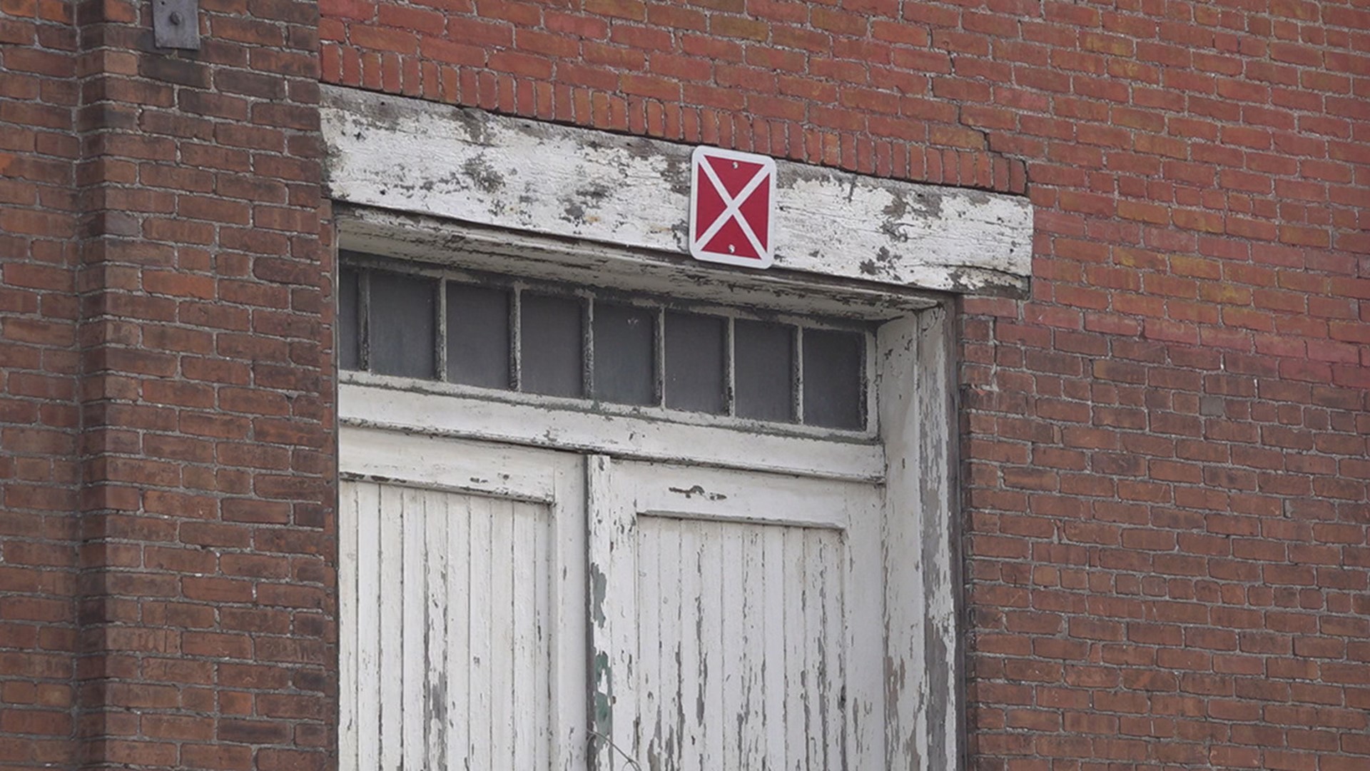 Dozens of buildings across the City of York sit abandoned, boarded up, and marked with a red 'X.'