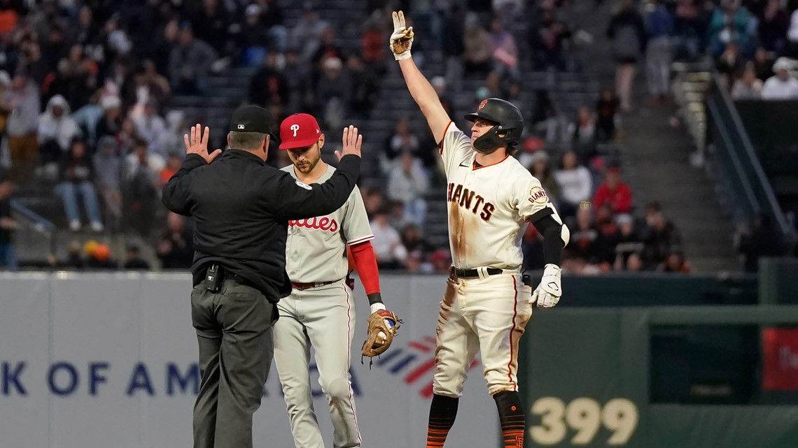 Phillies' Bryce Harper ejected after charging Rockies dugout