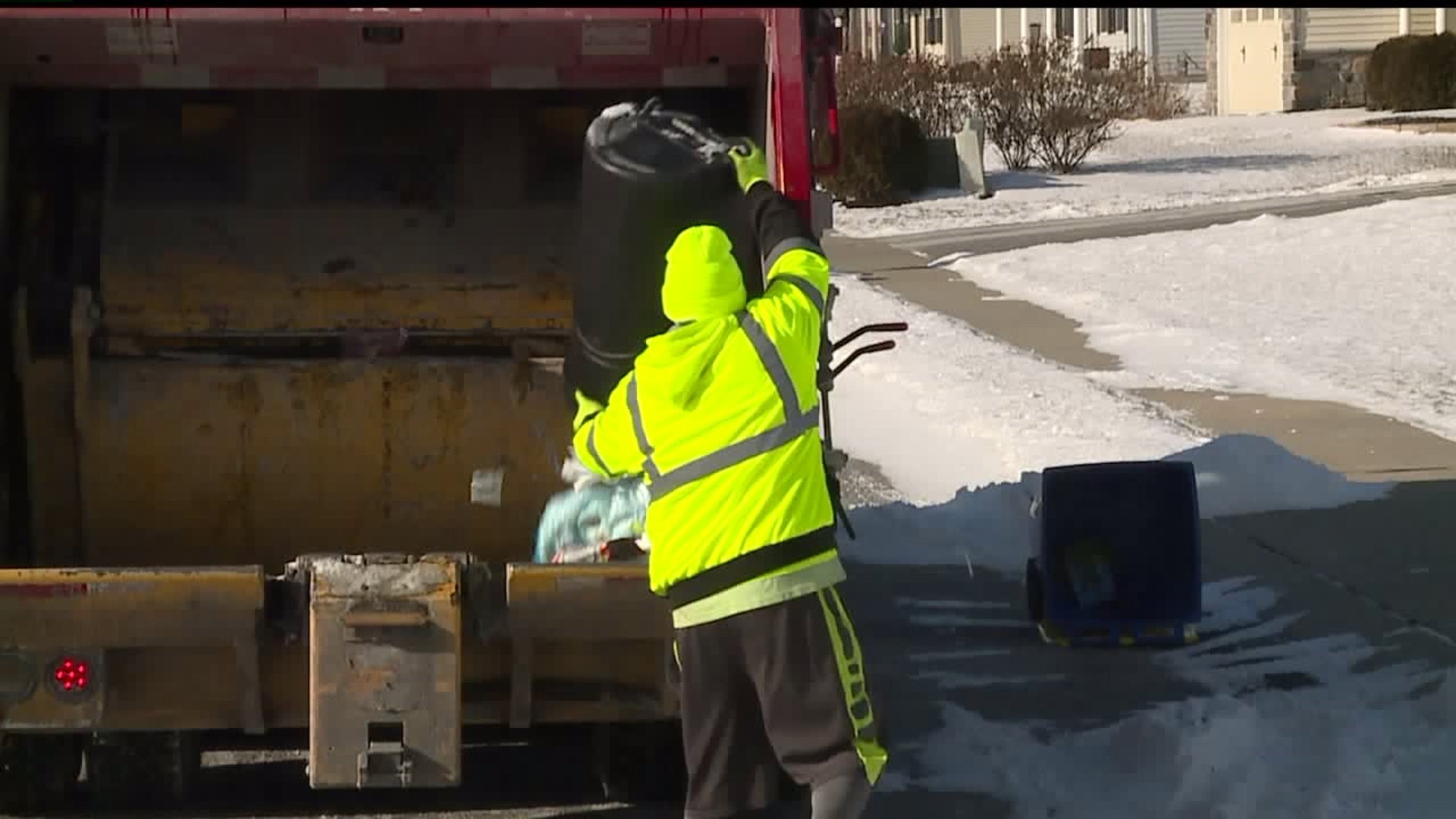 Trash collectors brave the frigid conditions