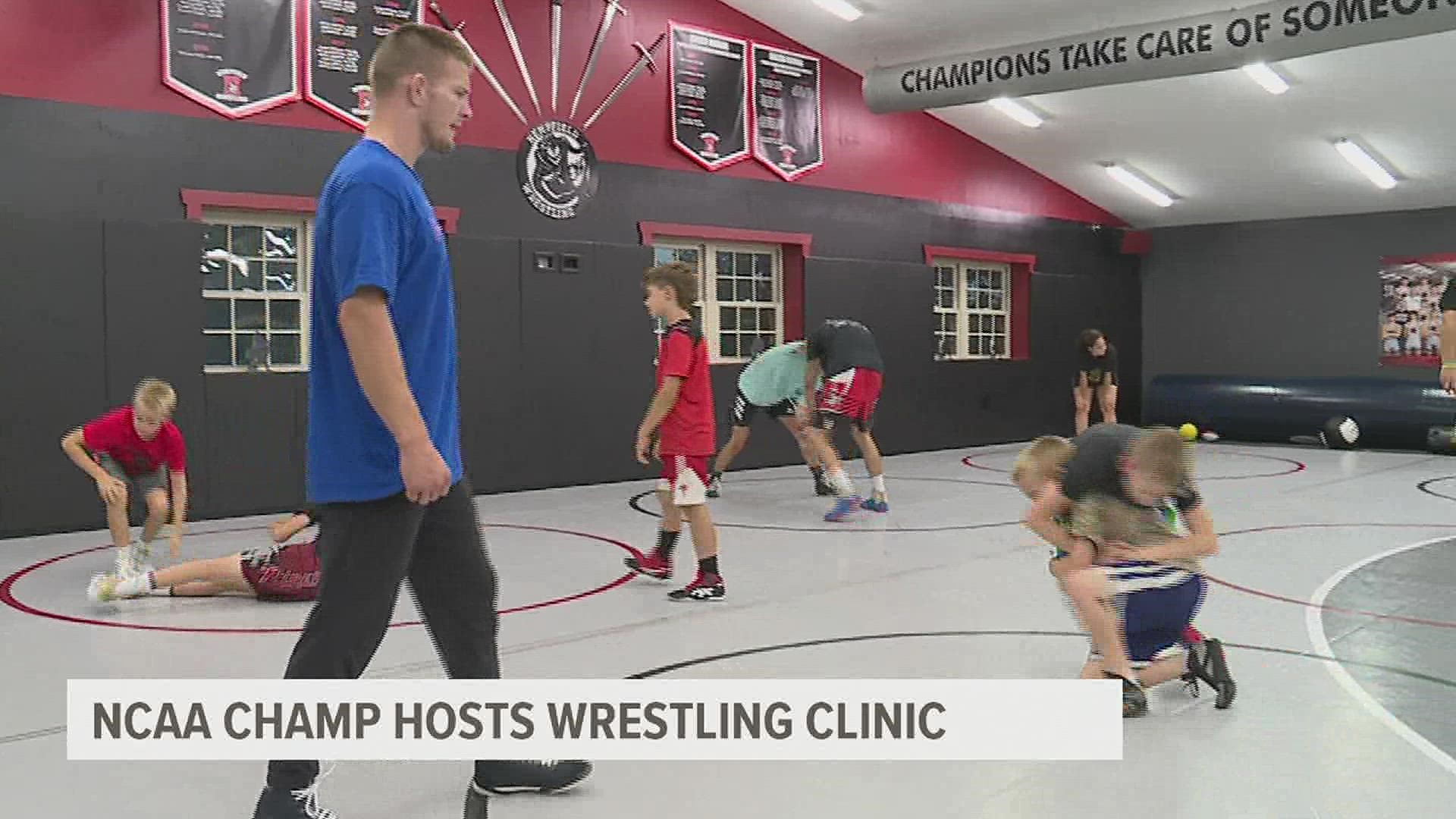 Jason Nolf advises wrestlers to go out and score points during week night camp