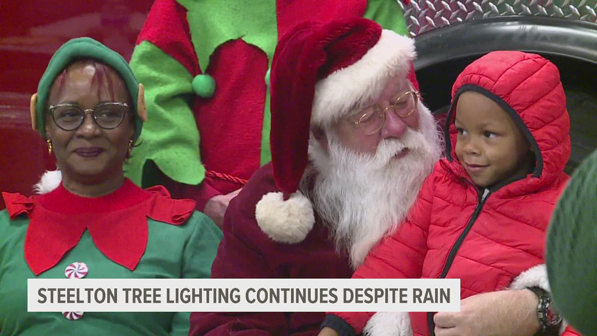 The rain didn't stop members of the Dauphin County community to gather at the municipal building in Steelton for the annual tree lighting.