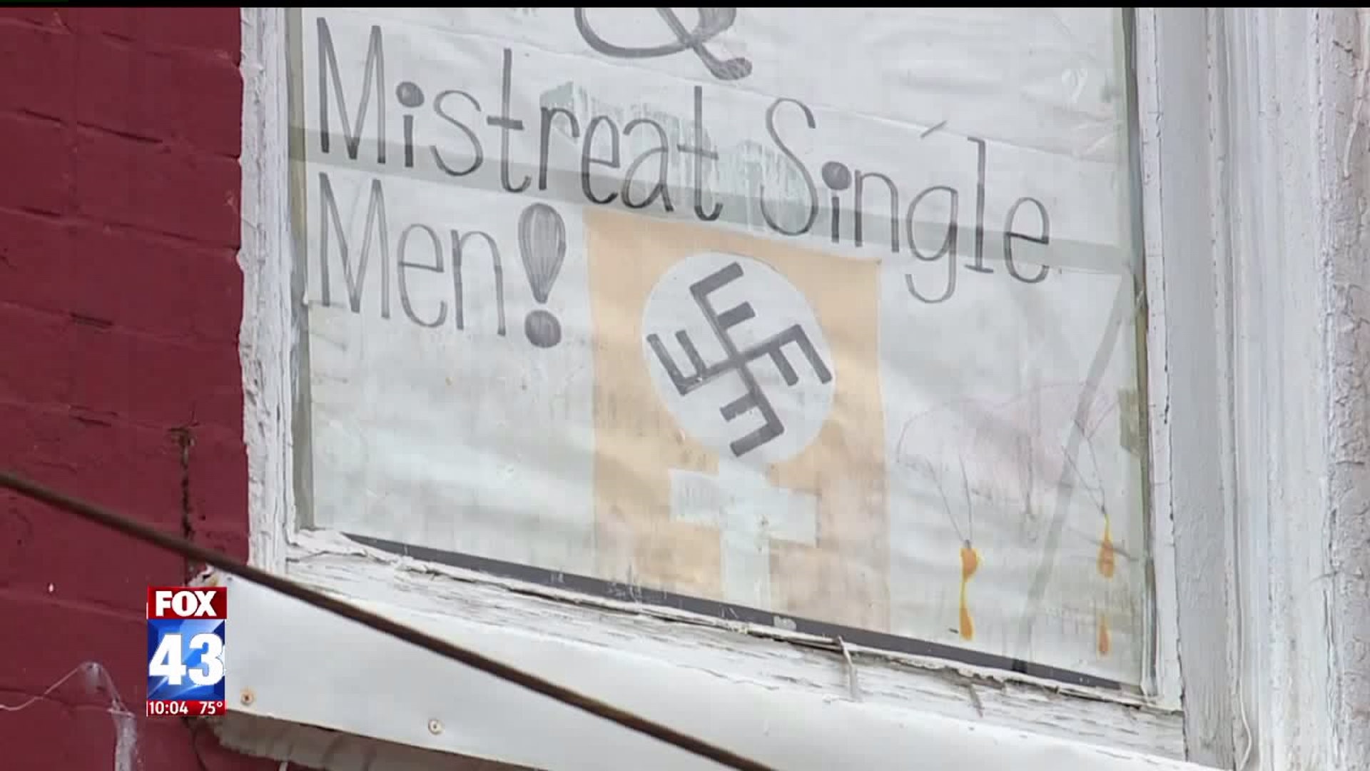 Anti-judiasm, anti-women hate speech written on apartment window posters in Lancaster