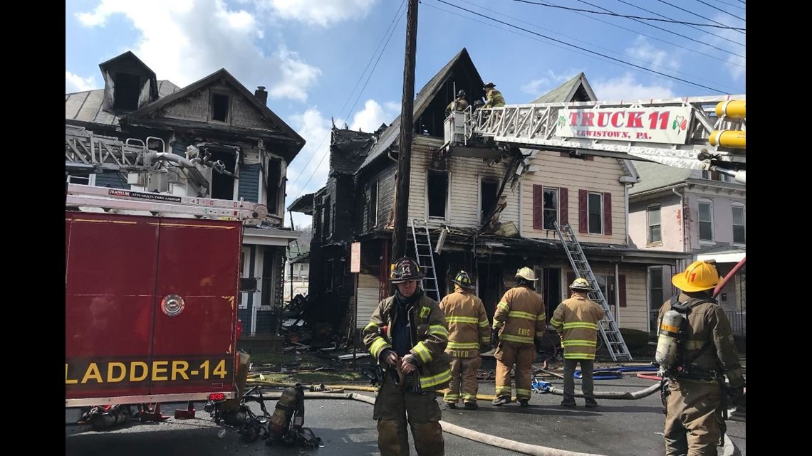 Fire crews battling blaze involving three homes in Lewistown