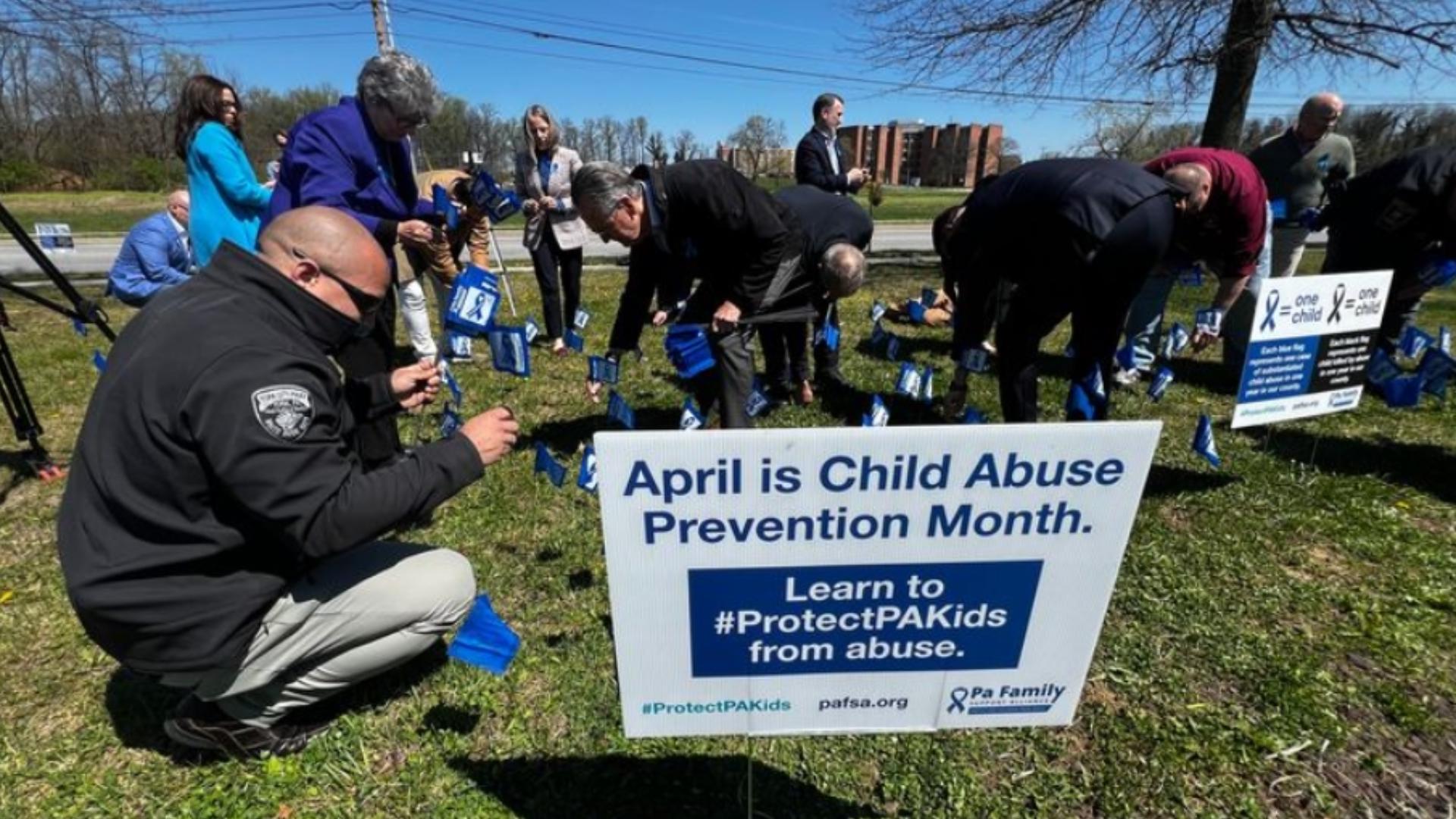 York County leaders and advocates plant flags in honor of child abuse ...