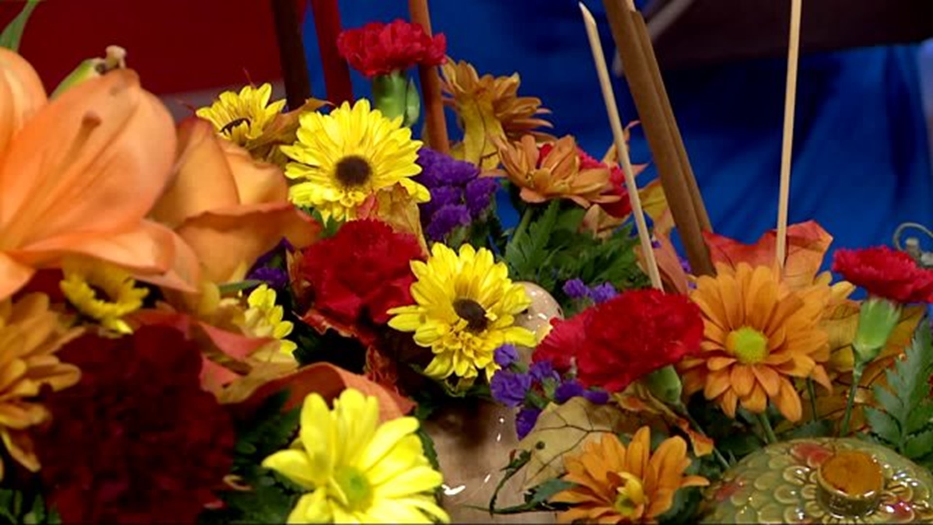 Royer`s Flowers puts together arrangements to bring your holiday table together