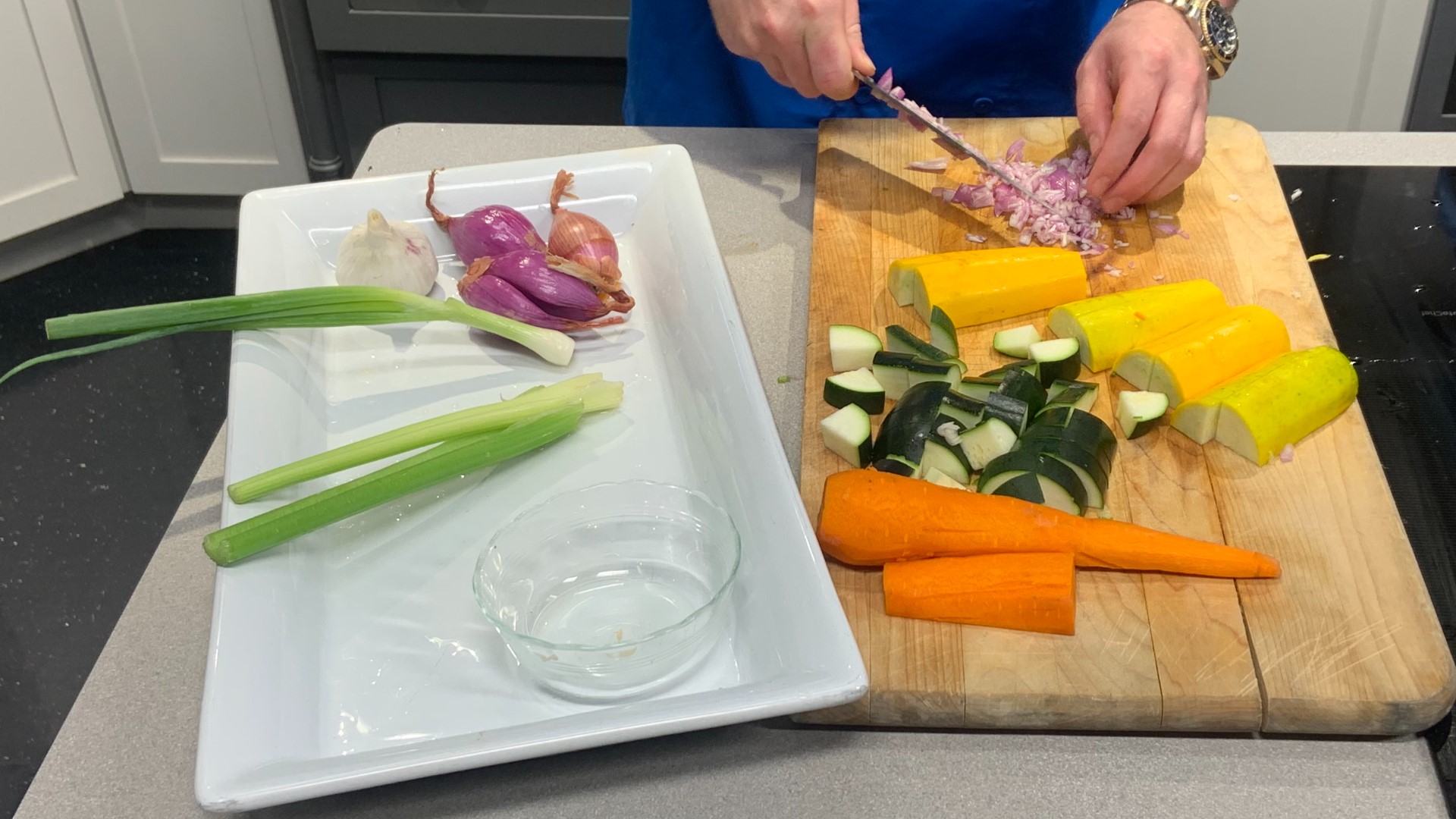 Summer is the season of seafood... and fresh veggies! Olivia's prepares a dish with room for both: crispy catfish served over rice pilaf and garden-style mussels.