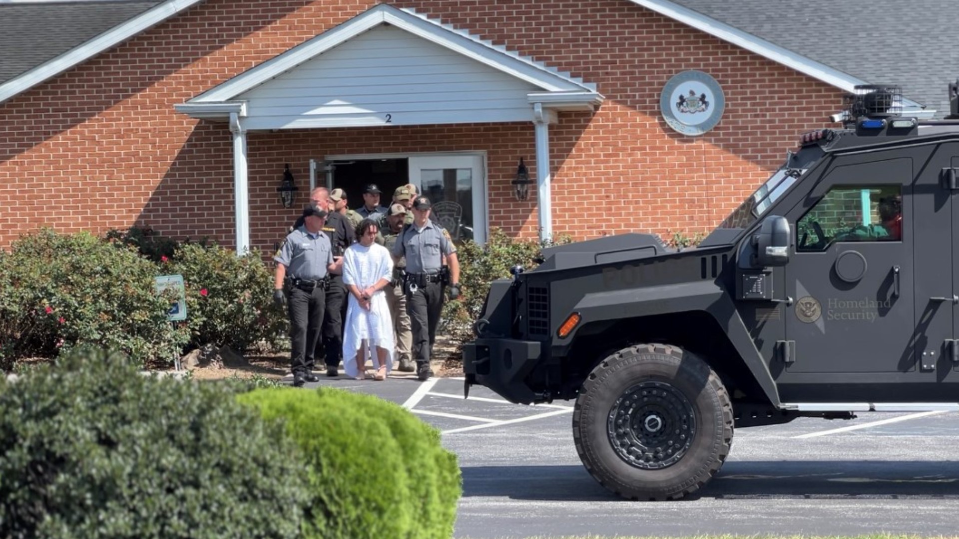 Dozens of people gathered at the State Police Avondale barracks Wednesday to watch Cavalcante be brought in for questioning after he was captured.