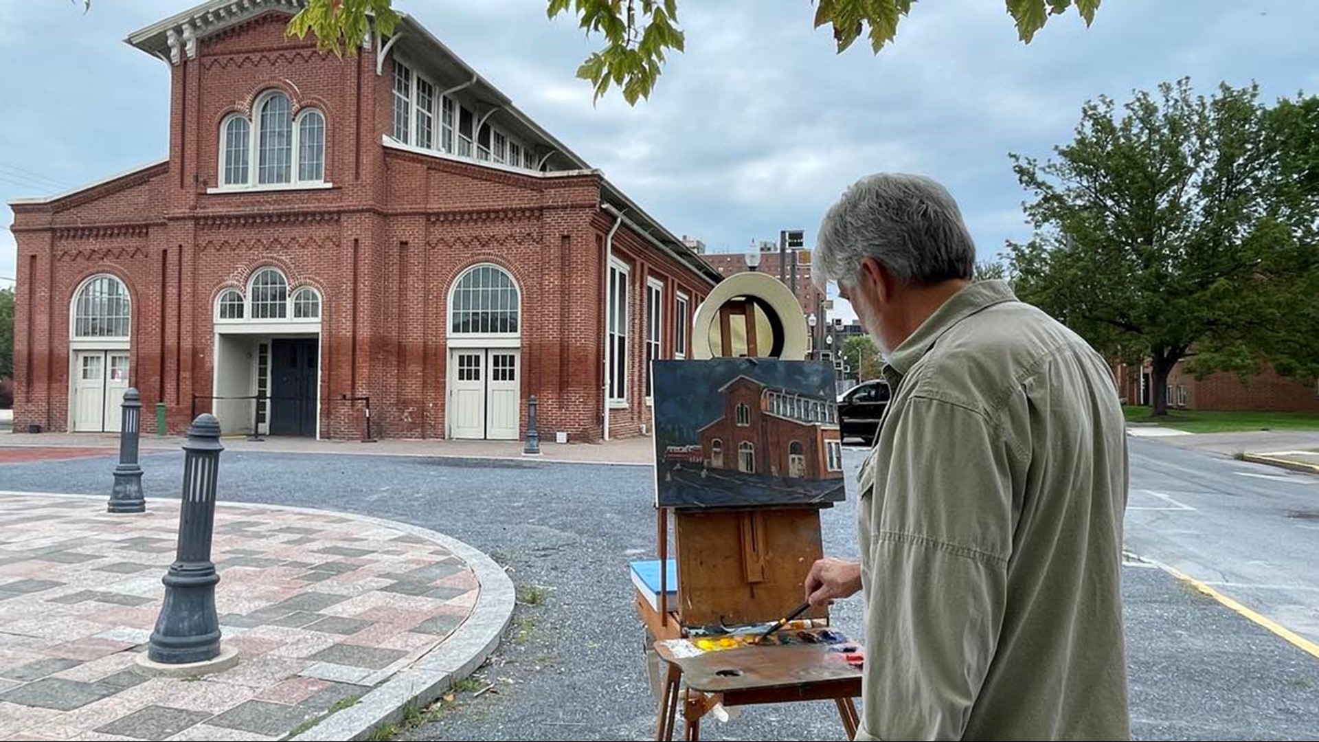 A local art auction is set to benefit the vendors displaced by a fire on July 10 that gutted the brick building of the Broad Street Market.