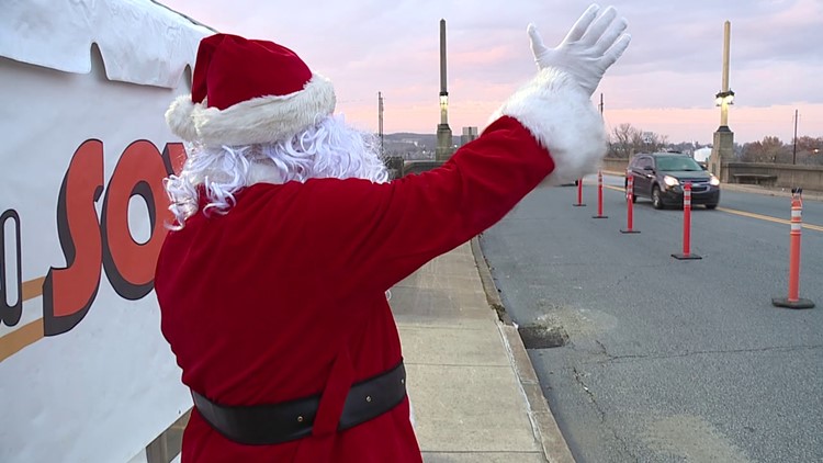'Santa D' back on the Wrightsville-Columbia Bridge with Toy Challenge