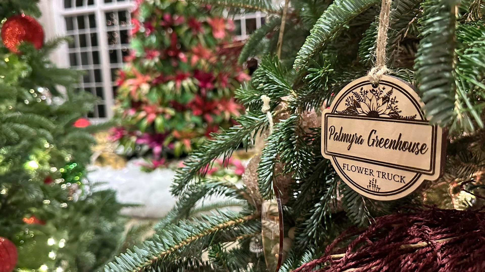 Local artists are decorating Christmas trees at Hershey Gardens.