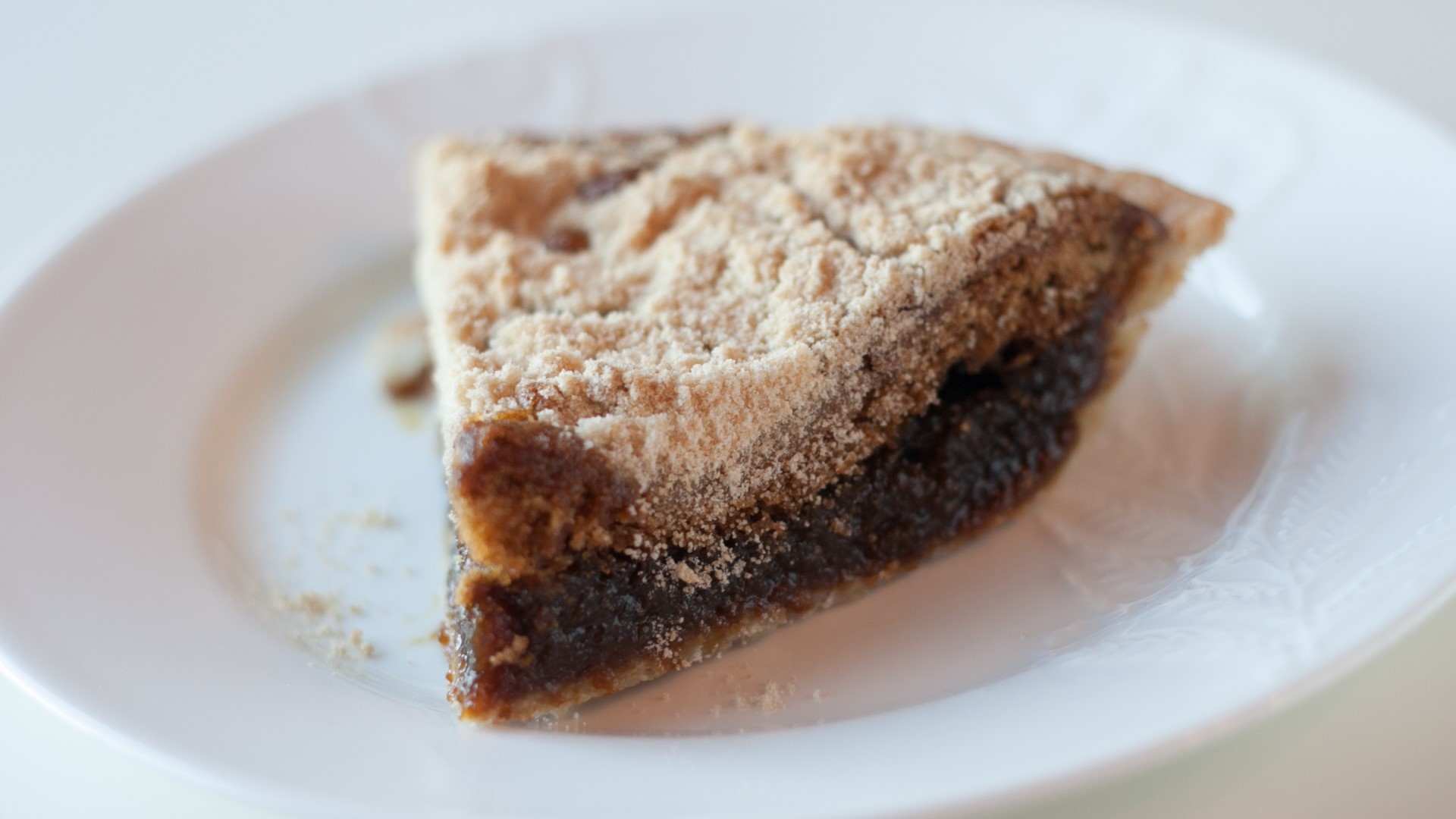 Owner Mary Brown demonstrates how to make a caramel apple nut pie available at Brown’s Orchards & Farm Market.