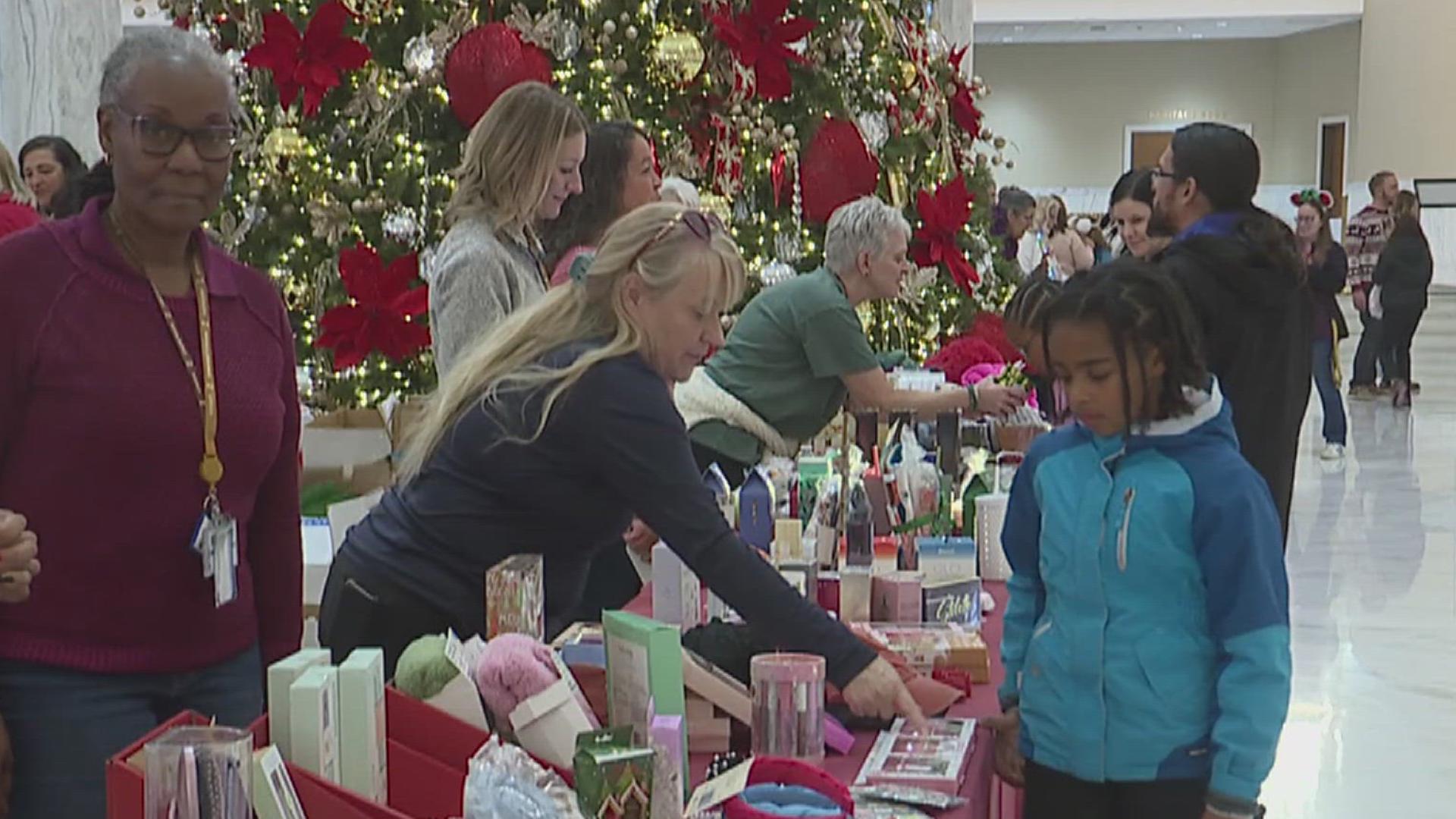 Every year, staff members donate holiday gifts for the Christmas Workshop, which students then get to pick out as gifts for loved ones.