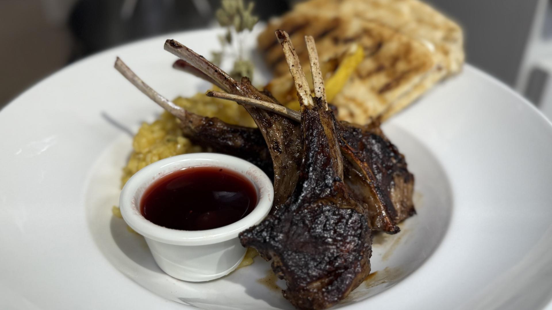 Oliva's prepares lamb chop lollipops over an autumn risotto