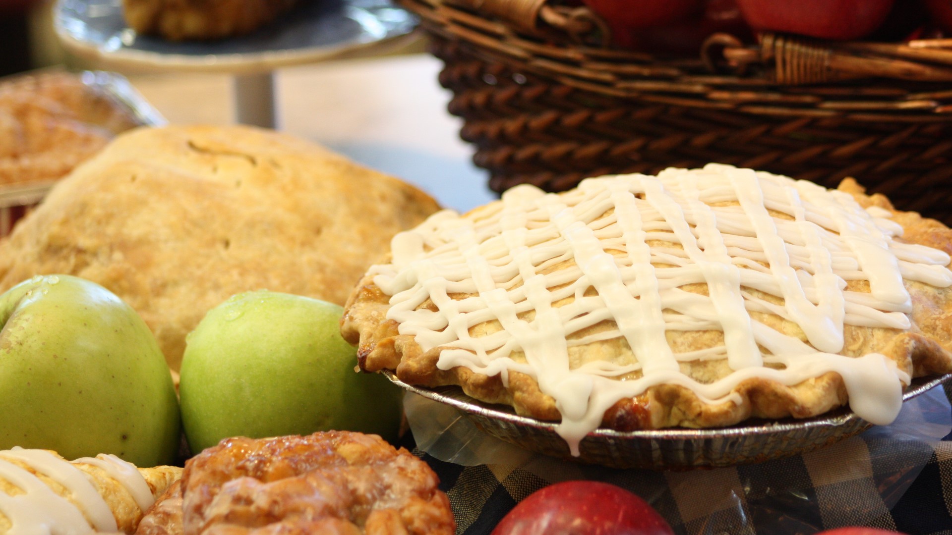 Owner Mary Brown demonstrates how to make a caramel apple nut pie available at Brown’s Orchards & Farm Market.