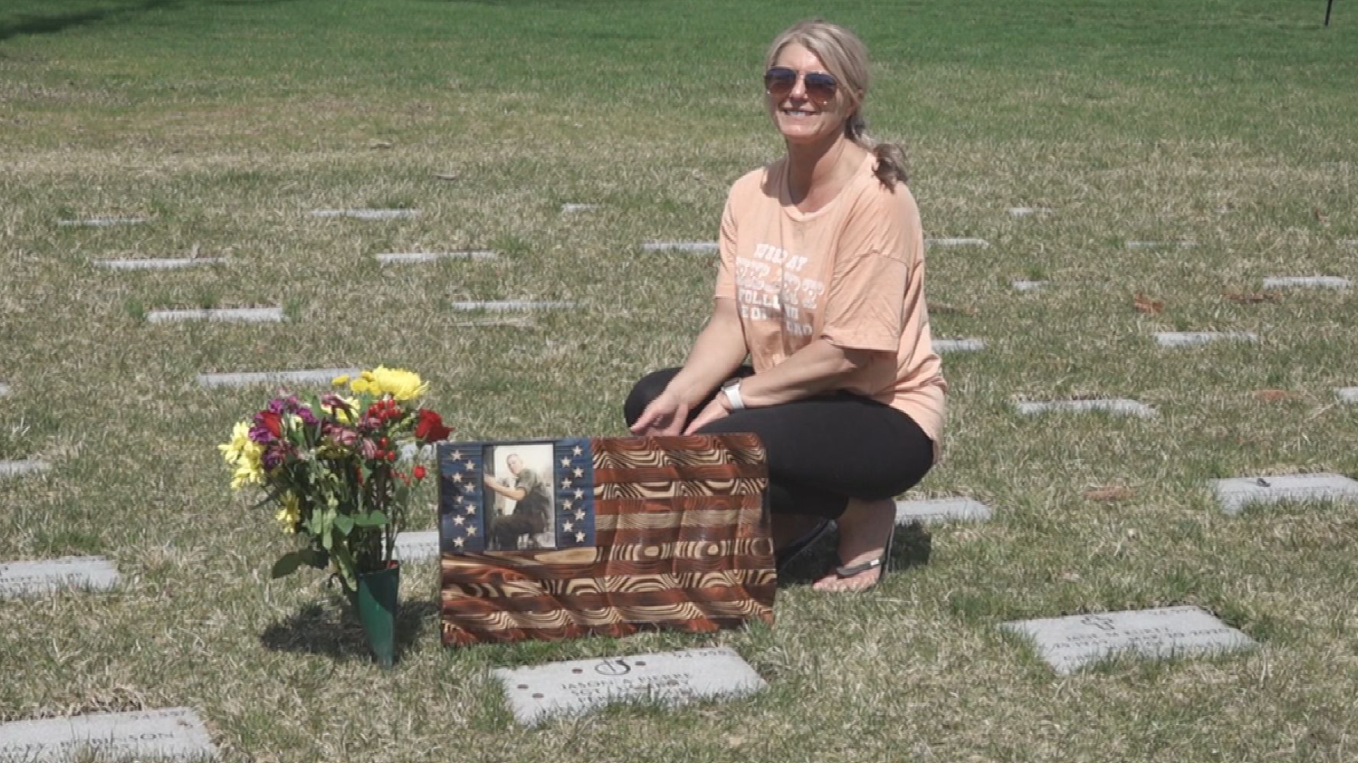 The handcrafted wooden flag was gifted by a Fulton County non-profit working to spread awareness about veteran suicide rates.