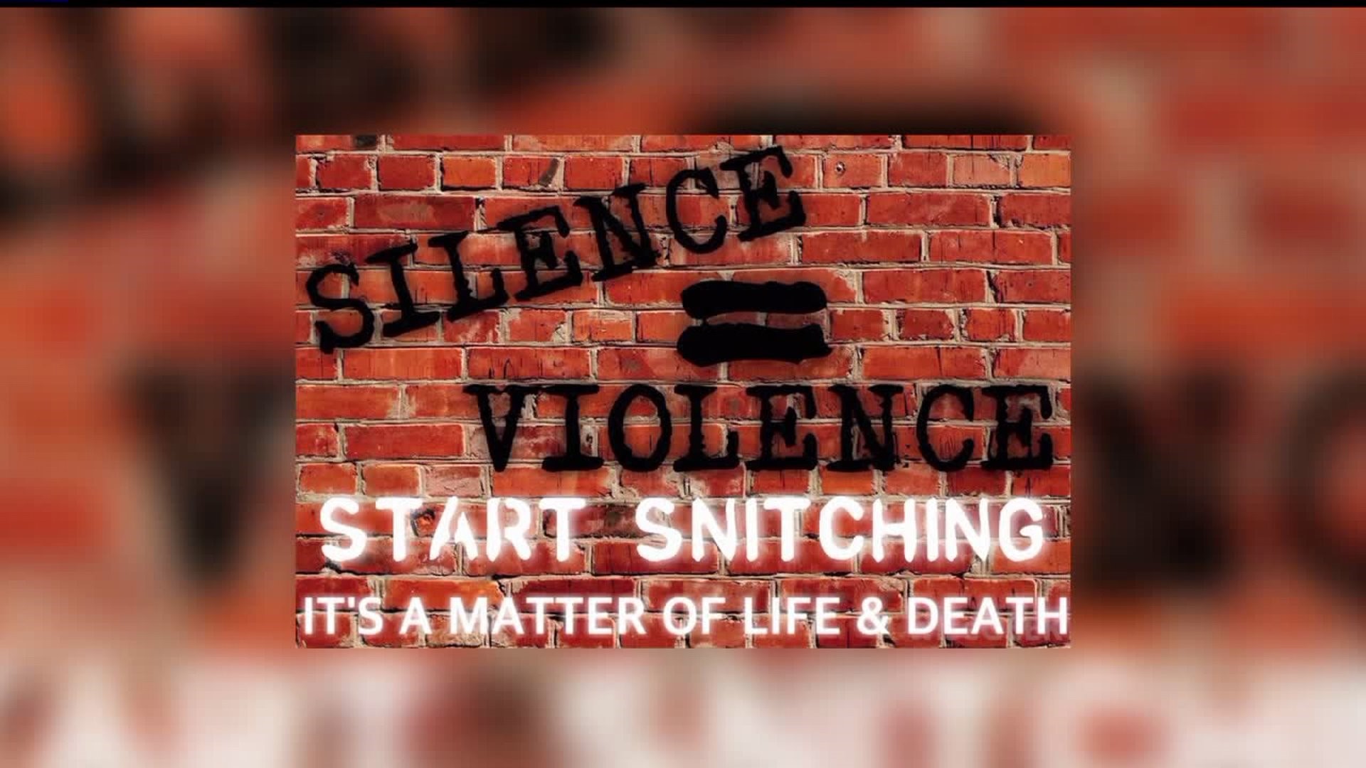 Community leader creates poster for York: "Silence equals violence. Start snitching."