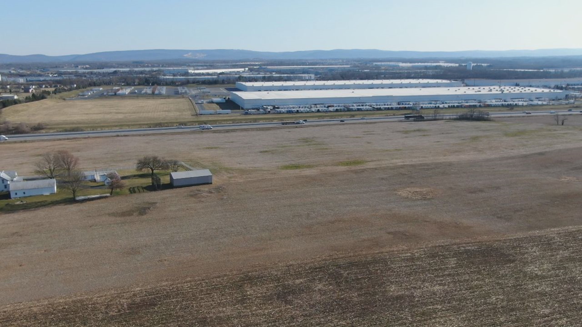 The Board of Supervisors voted to adopt a change to the zoning proposal that would turn 150+ acres of farmland into a potential warehouse.