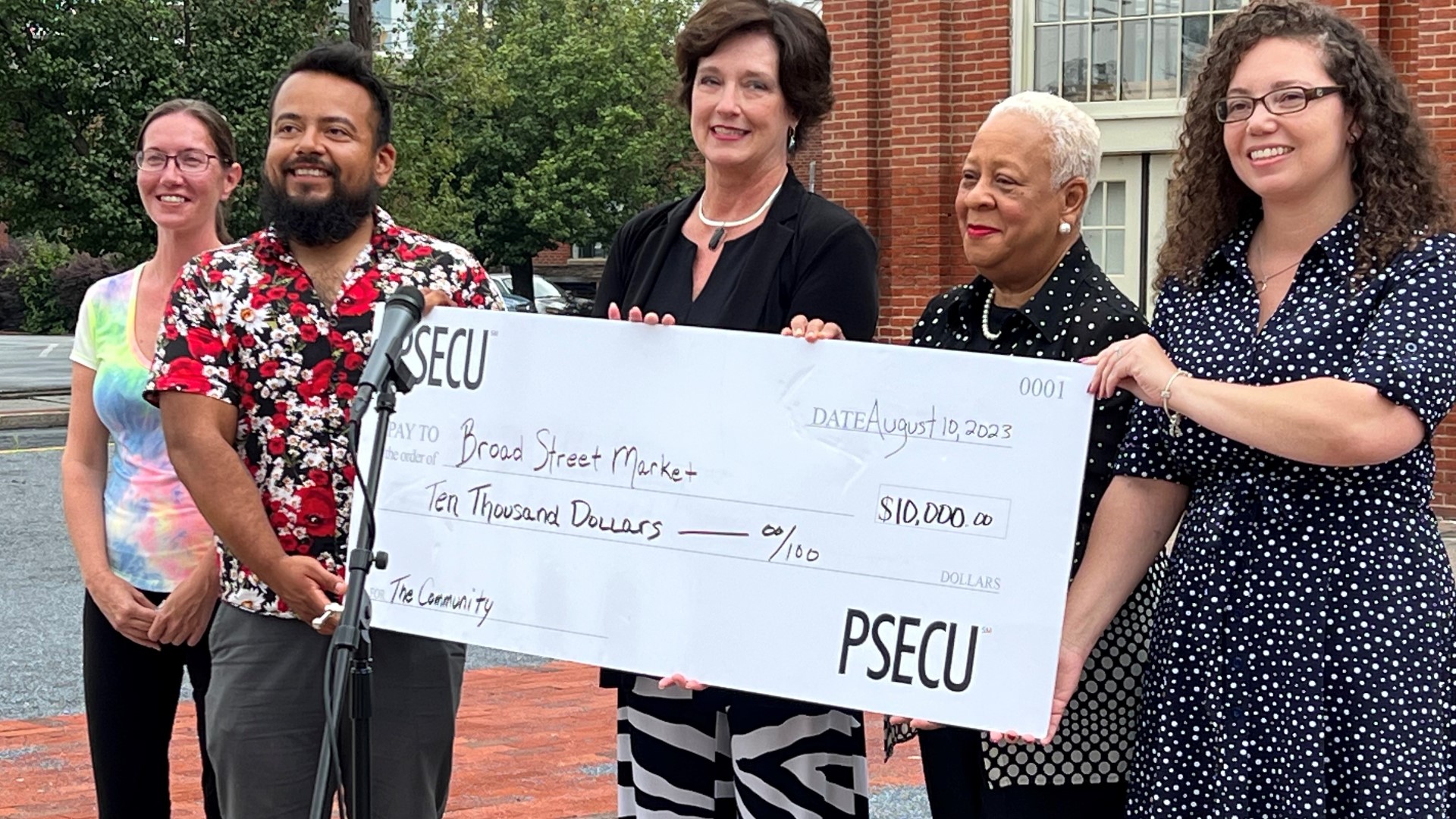 PSECU, the largest credit union in the state, presented a $10,000 check to the Broad Street Market and the City of Harrisburg.