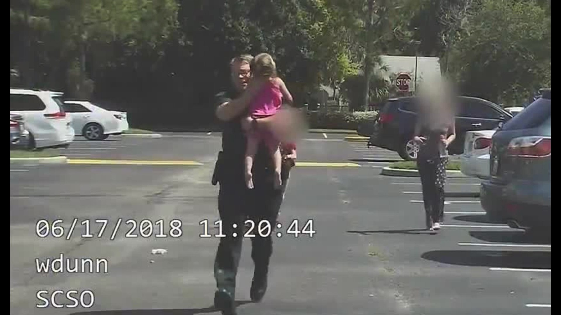 Dramatic dash cam video shows moment deputy saves little girl from hot ...