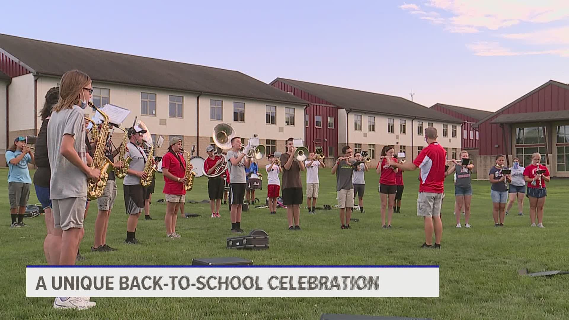 Dozens of cars drove through the high school parking lot for a taste of Little Dutchmen school spirit and some delicious Farm Show milkshakes.