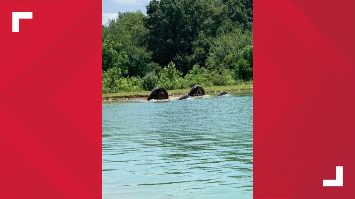 Truck overturns in York County pond