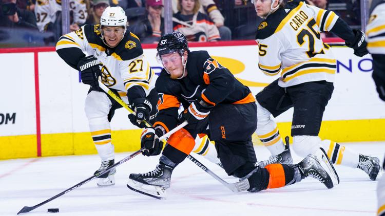 Bruins break NHL single-season wins record by beating Flyers